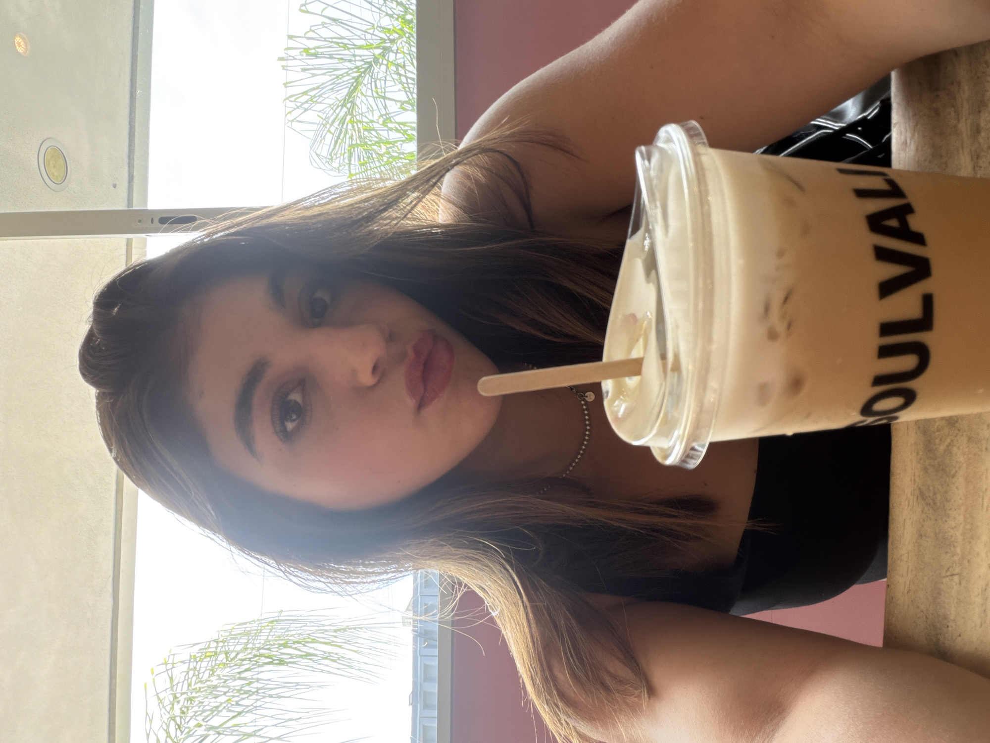 Woman documents café visit with friends in Puebla