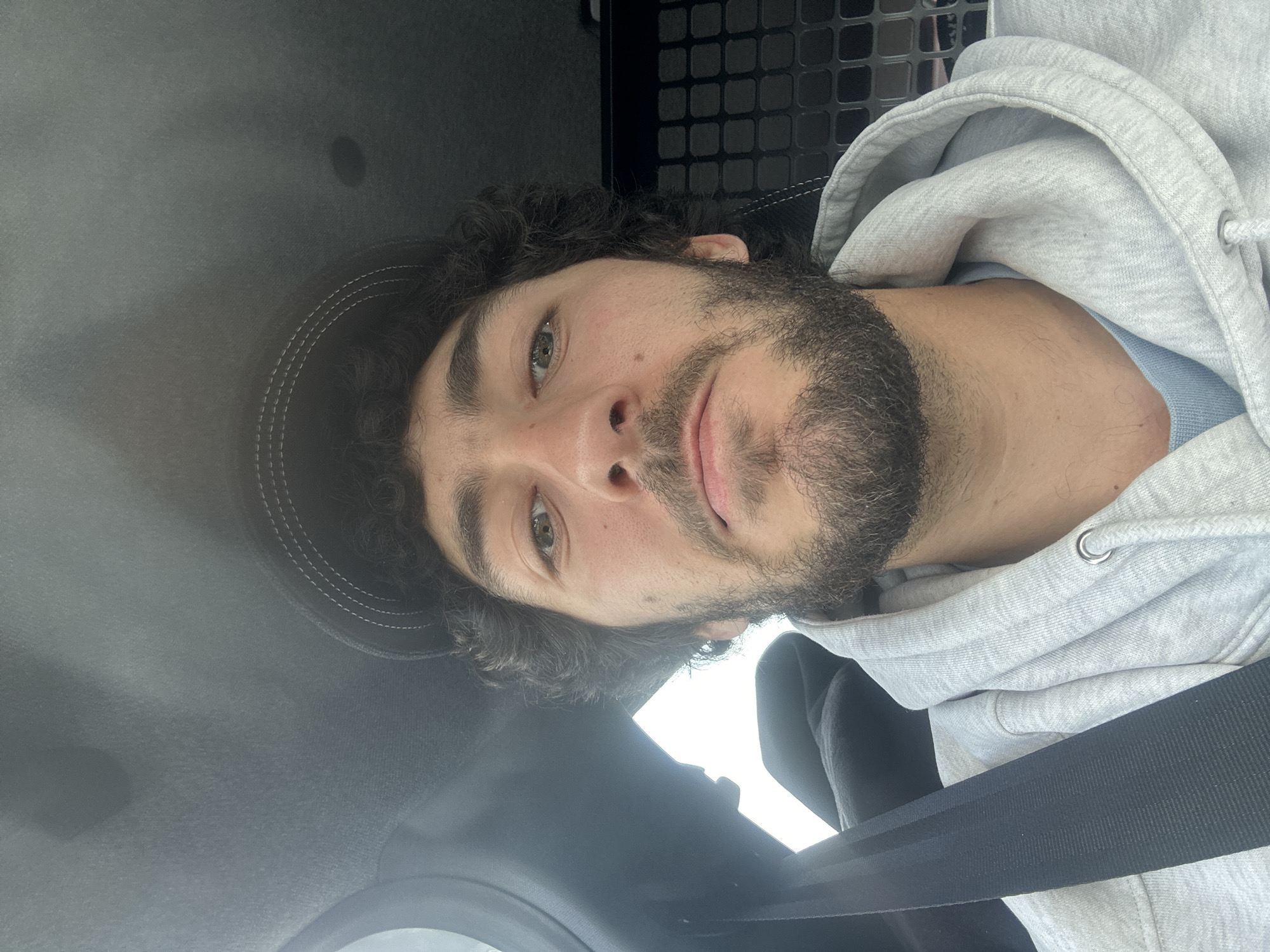 Man takes car selfie in Banteux, France
