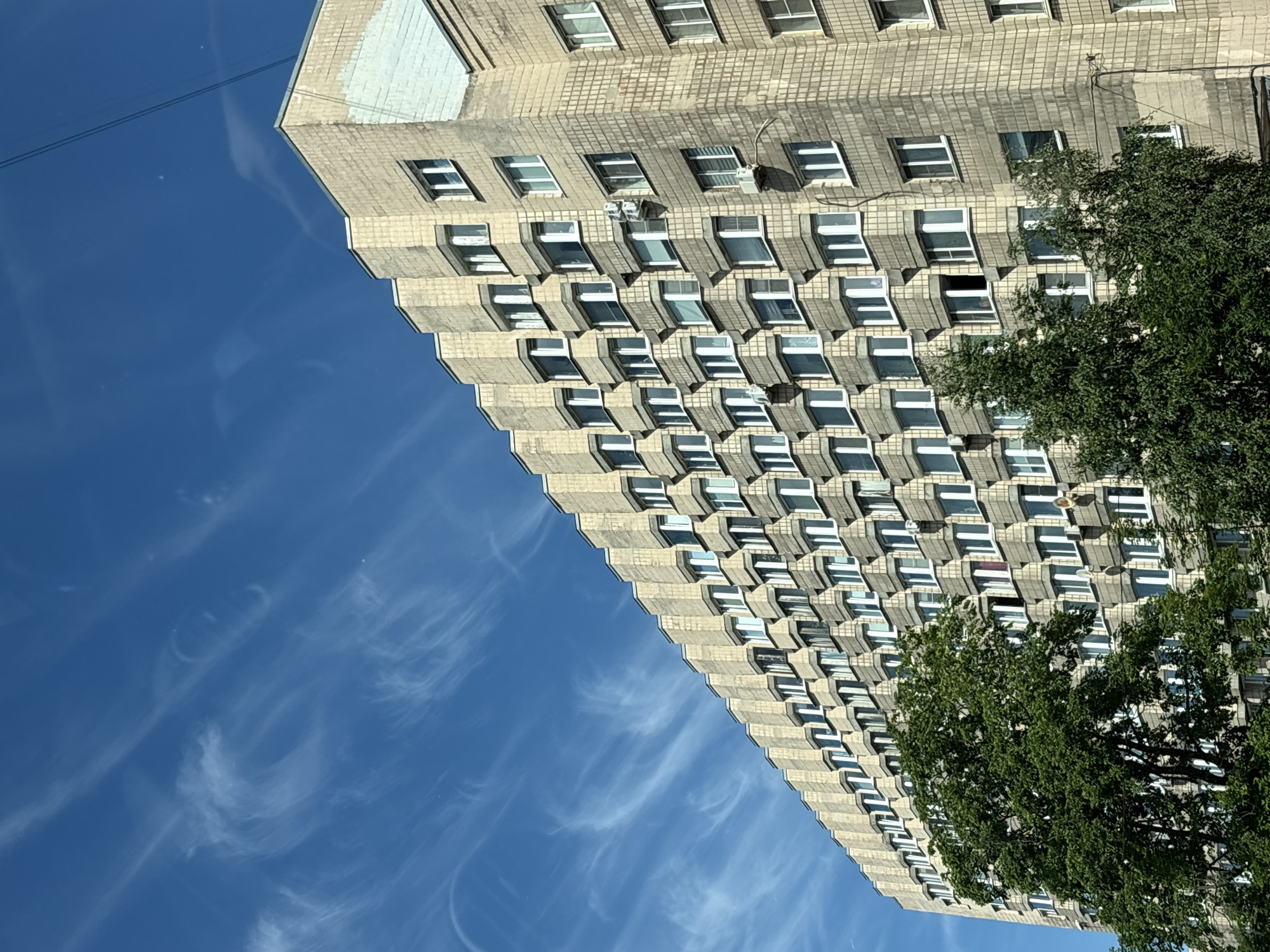 Soviet-era apartment block catches morning light in Saint Petersburg