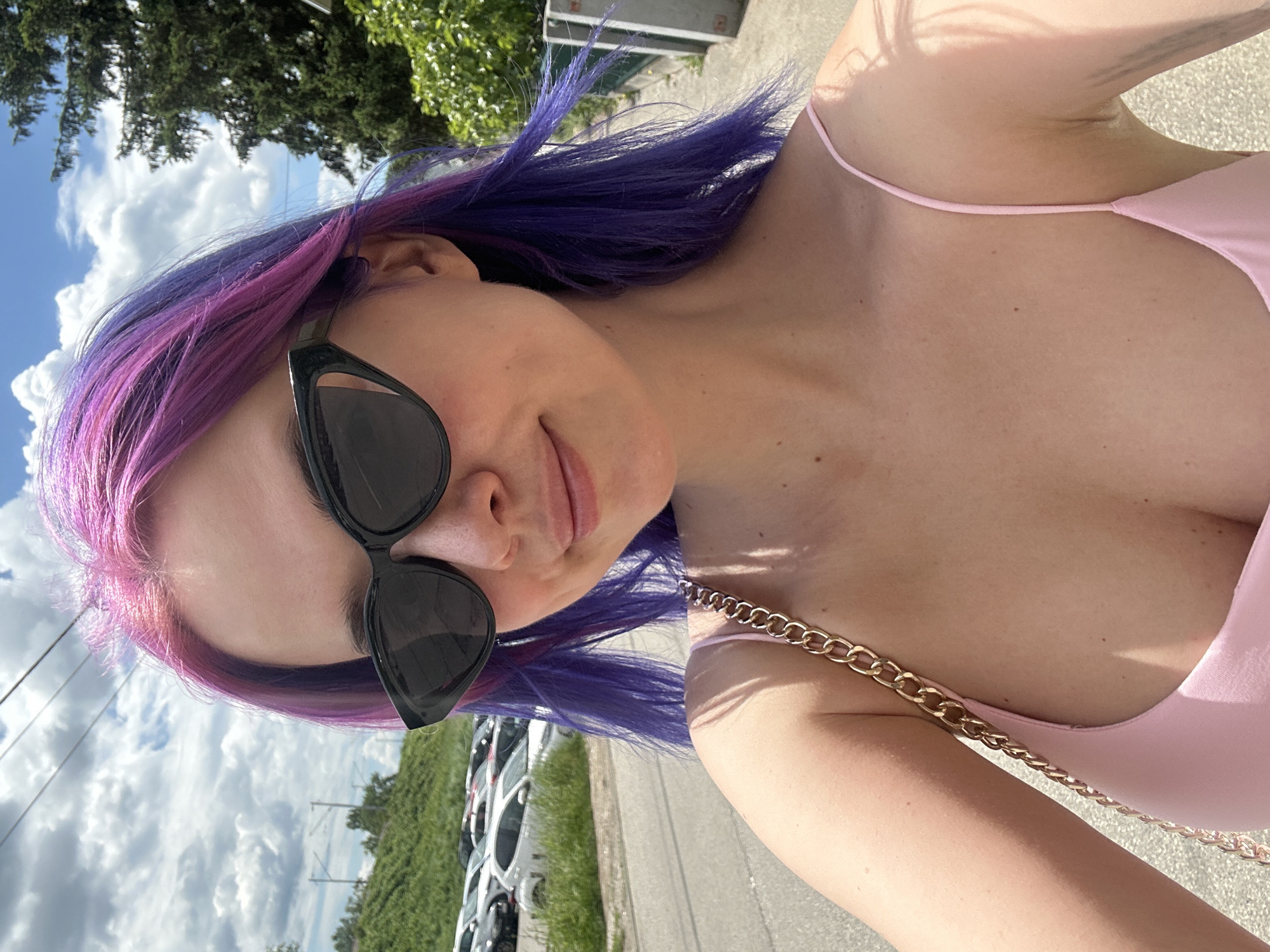 Colorful-haired visitor documents spring blooms during Zagreb morning stroll