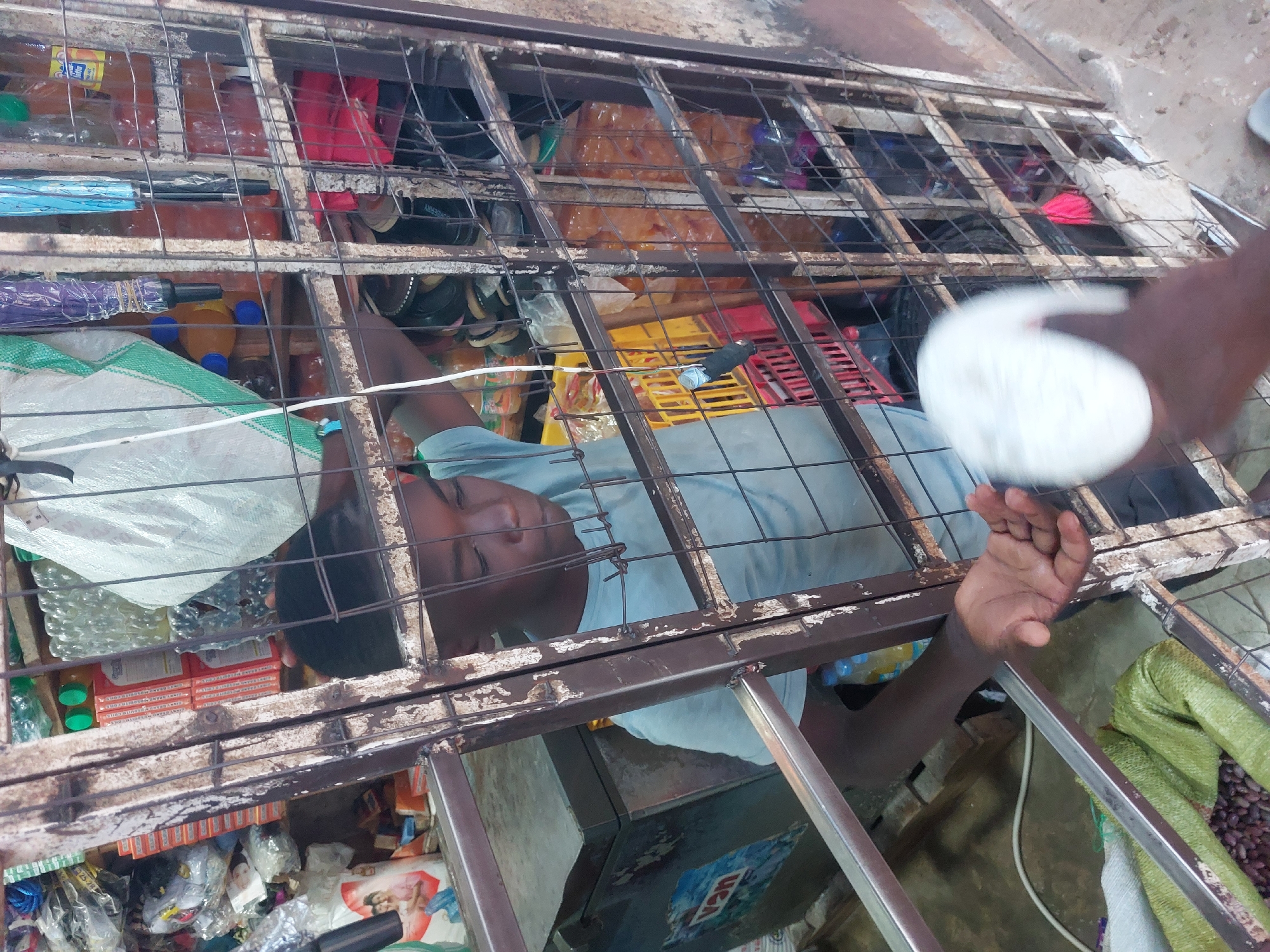 Daily life documented across muddy Dar es-Salaam neighborhoods