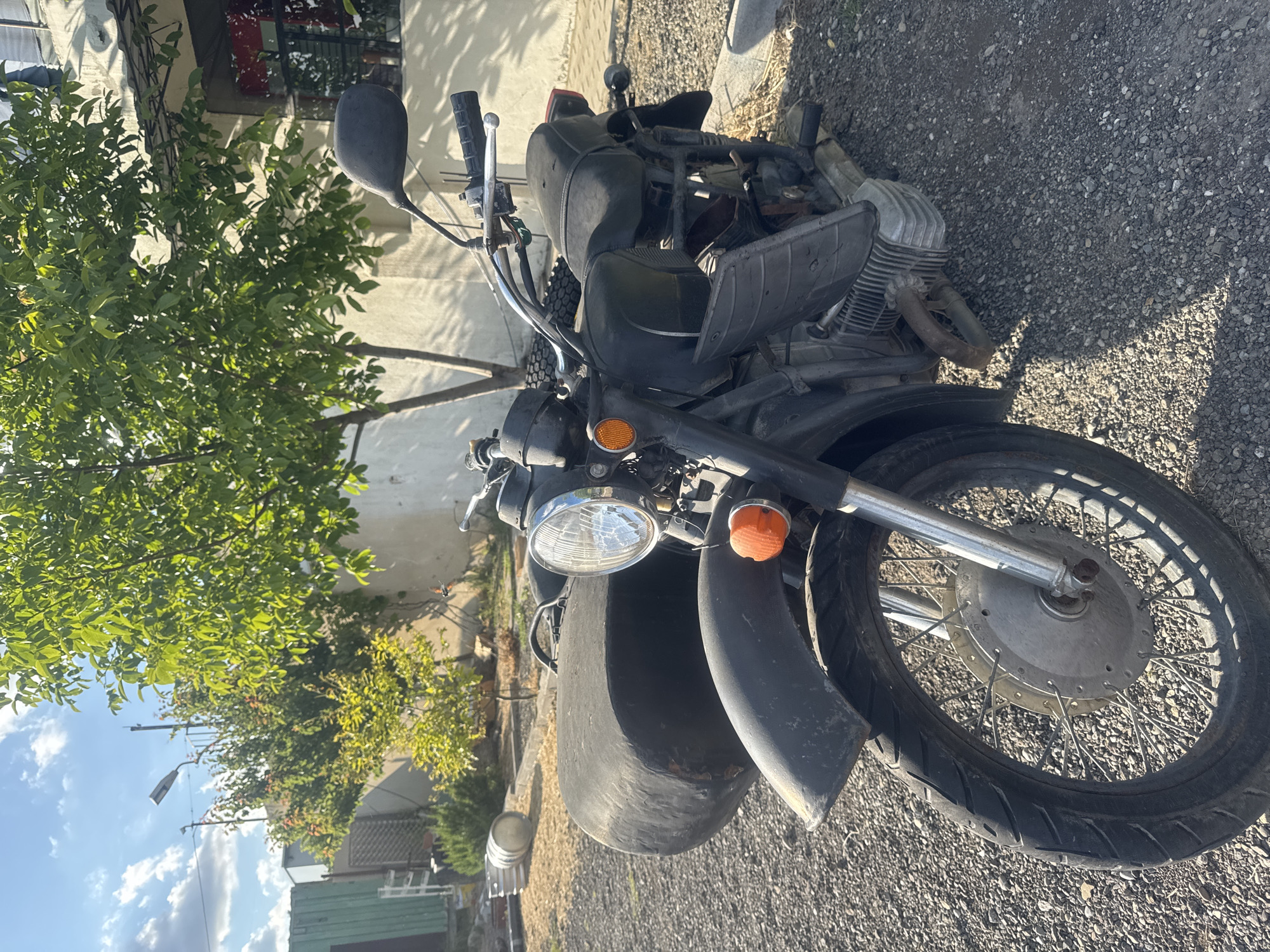 Vintage motorcycles on containers documented near Tbilisi cathedral