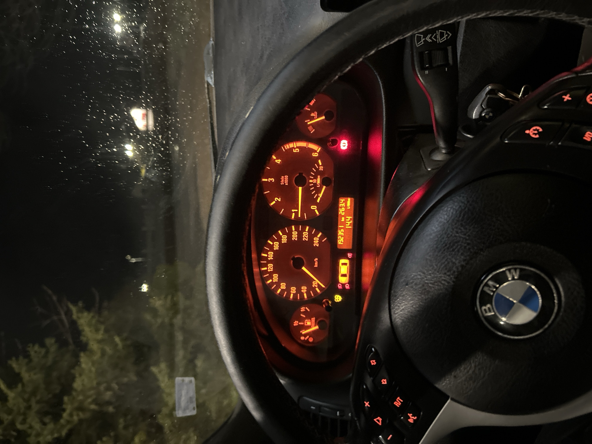 BMW dashboard illuminated at night in Vratsa, Bulgaria