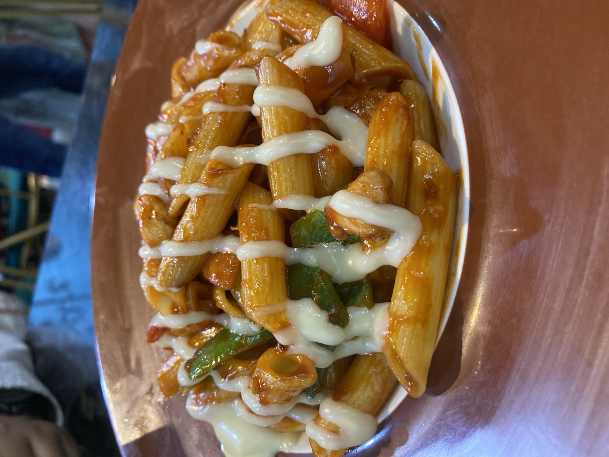 Family dining scene captured at Dhaka restaurant serving pasta