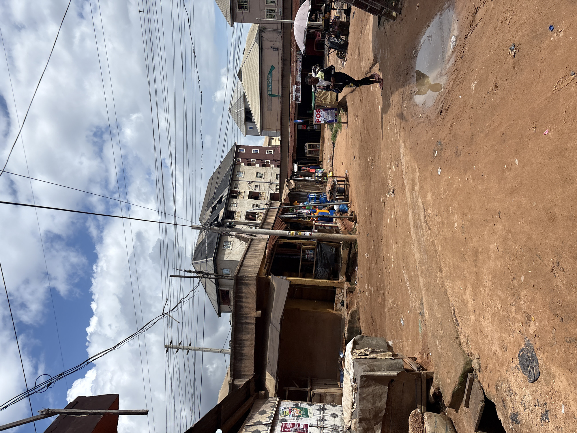 Busy market street and okada traffic in Nkpor, Nigeria