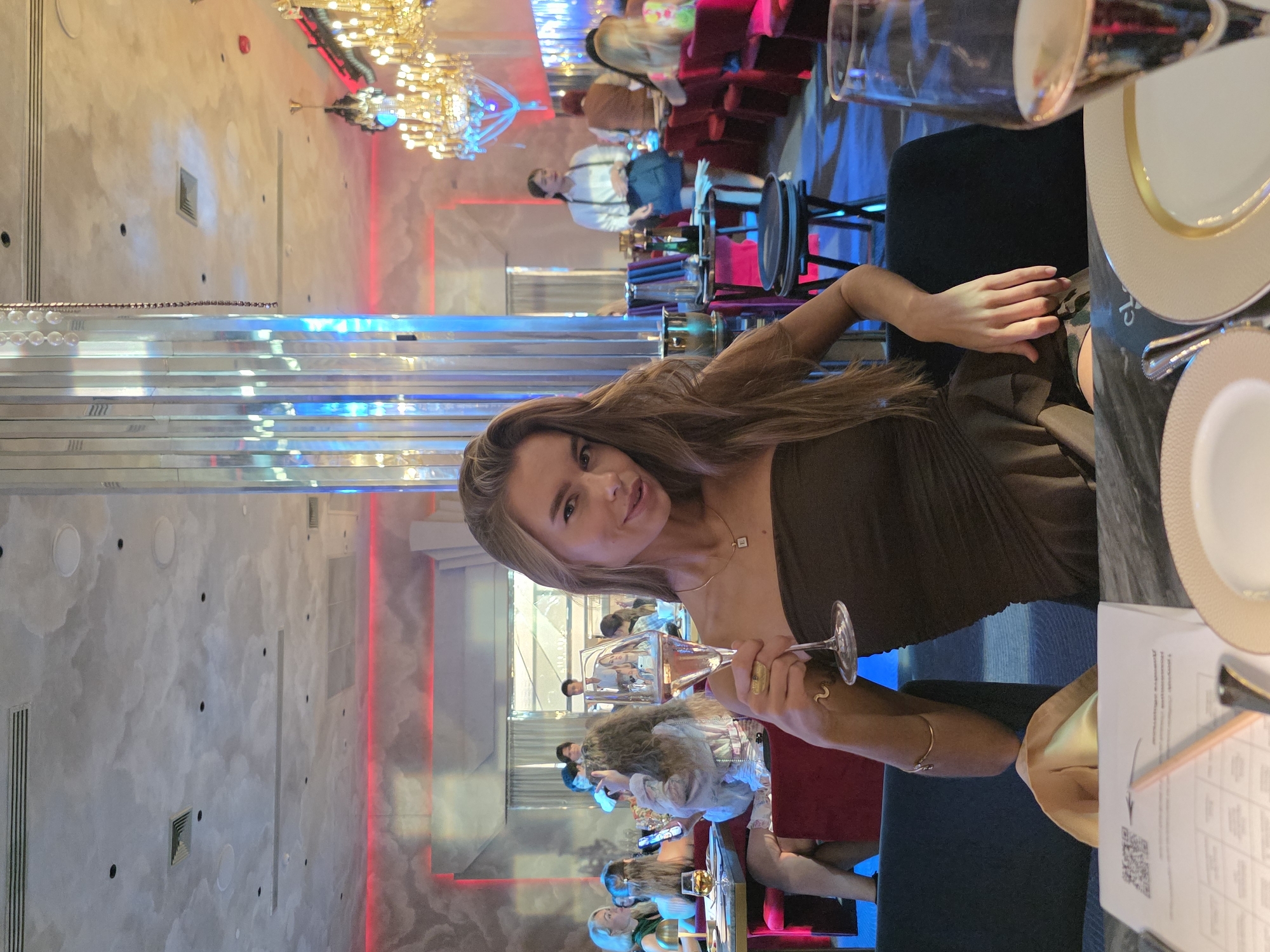 Woman dines at upscale restaurant in Choeng Thale, Thailand