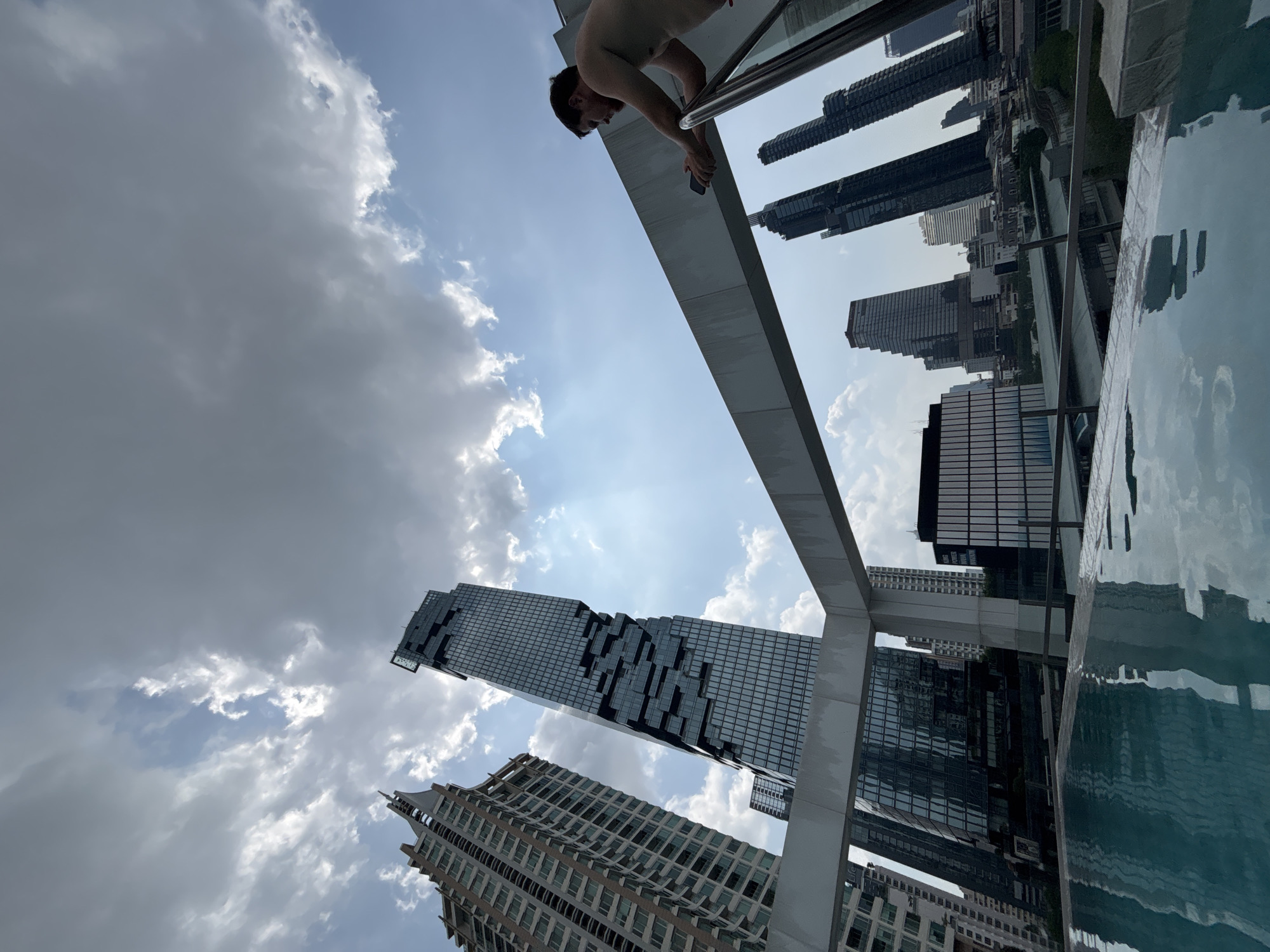 Morning snapshots capture routine Bangkok street life and rooftop leisure
