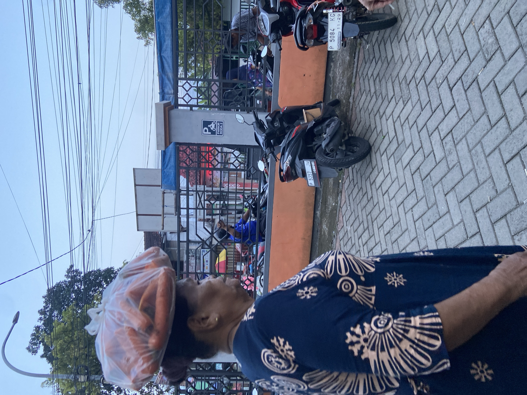 Evening market activity captured in Jember, Indonesia