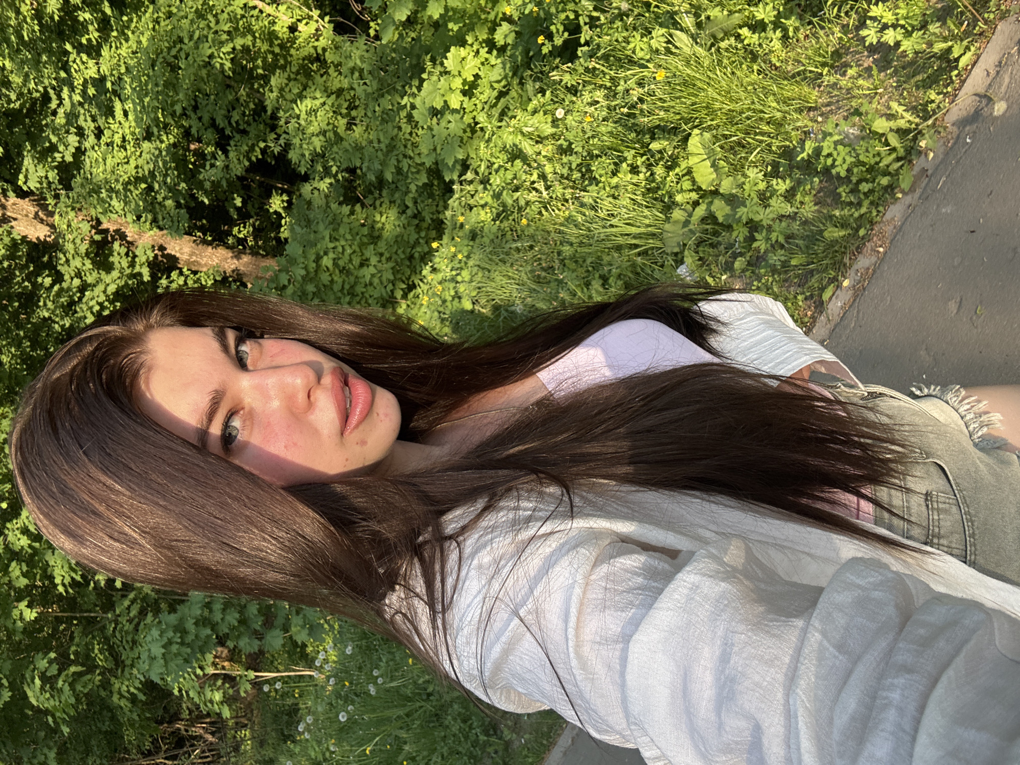 Woman photographed in multiple outdoor locations near Troshkovo, Russia