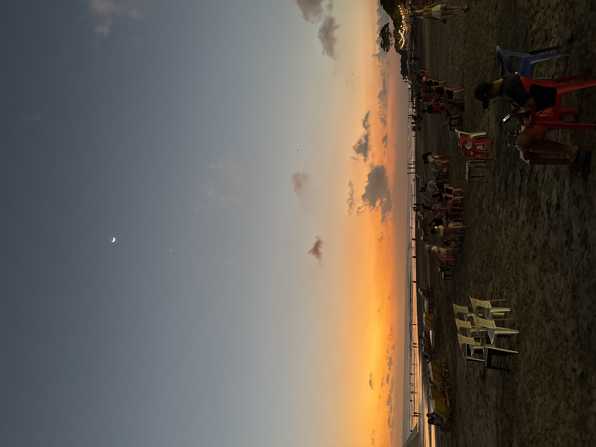 Kuta beach and streets wind down into a Bali evening