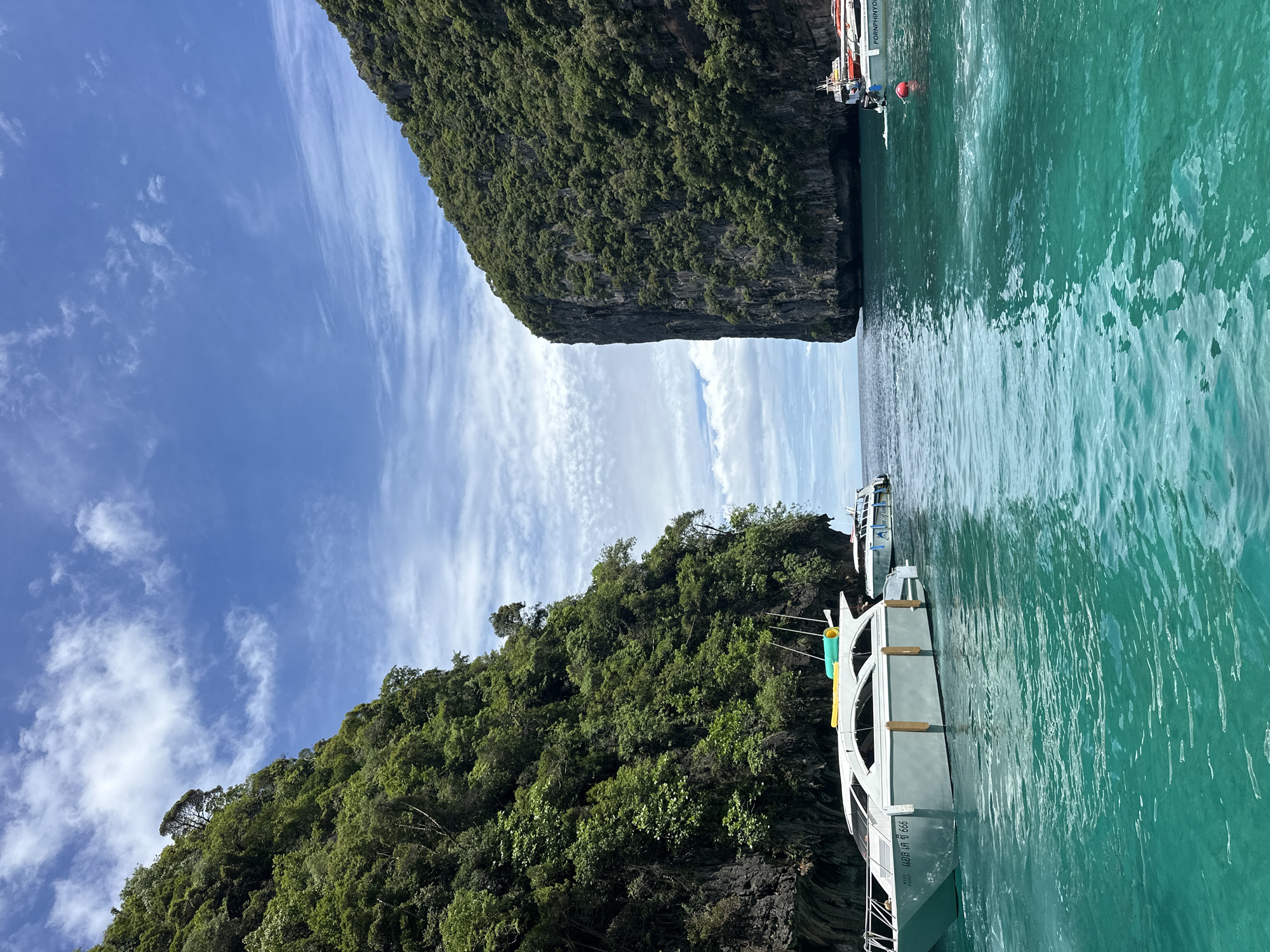 Ao Nang bay life: boats, karsts, and shoreside crowds
