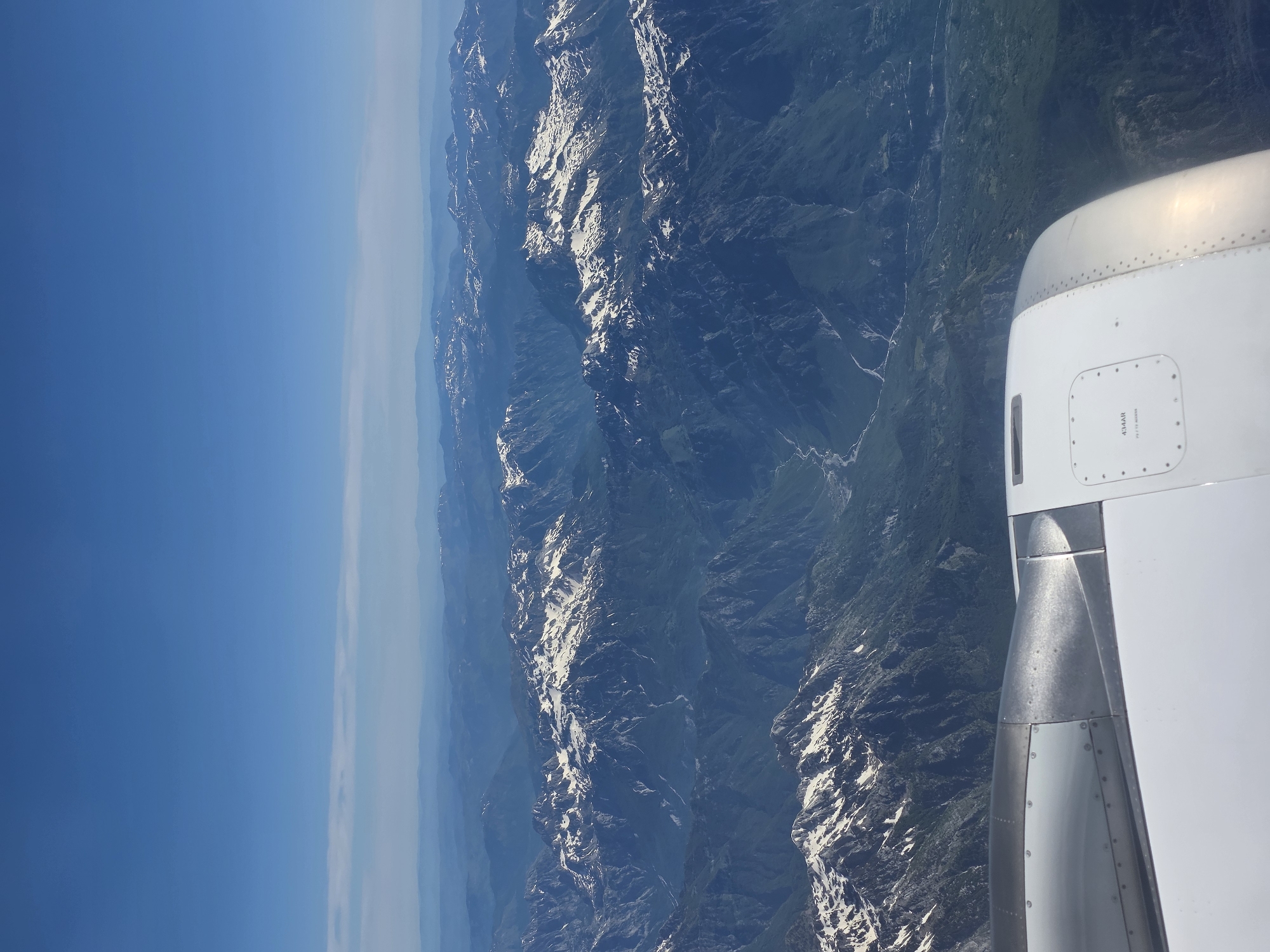 Passenger captures aerial view of Albanian mountains from aircraft