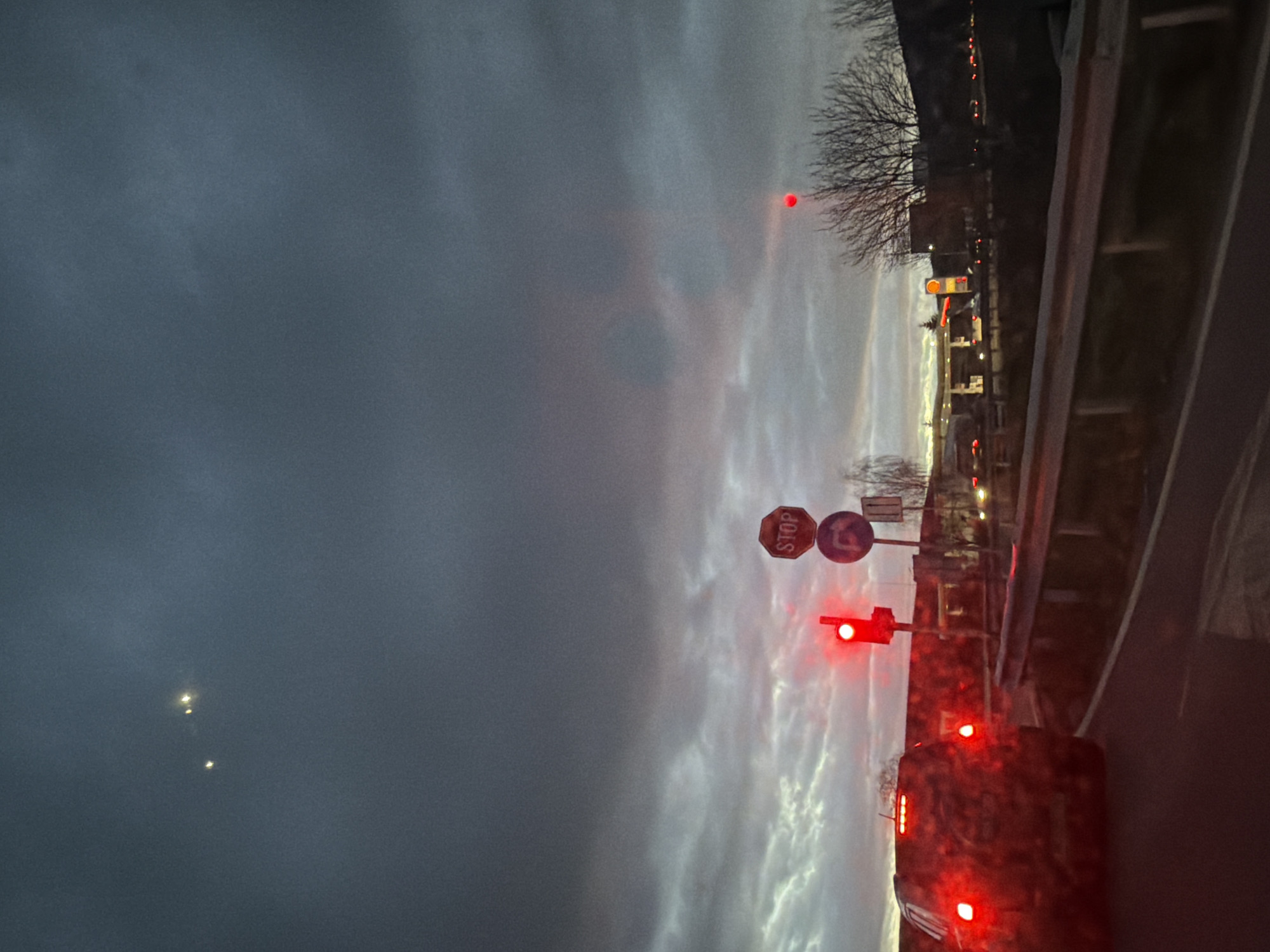 Early morning traffic navigates red light in Dragichevo