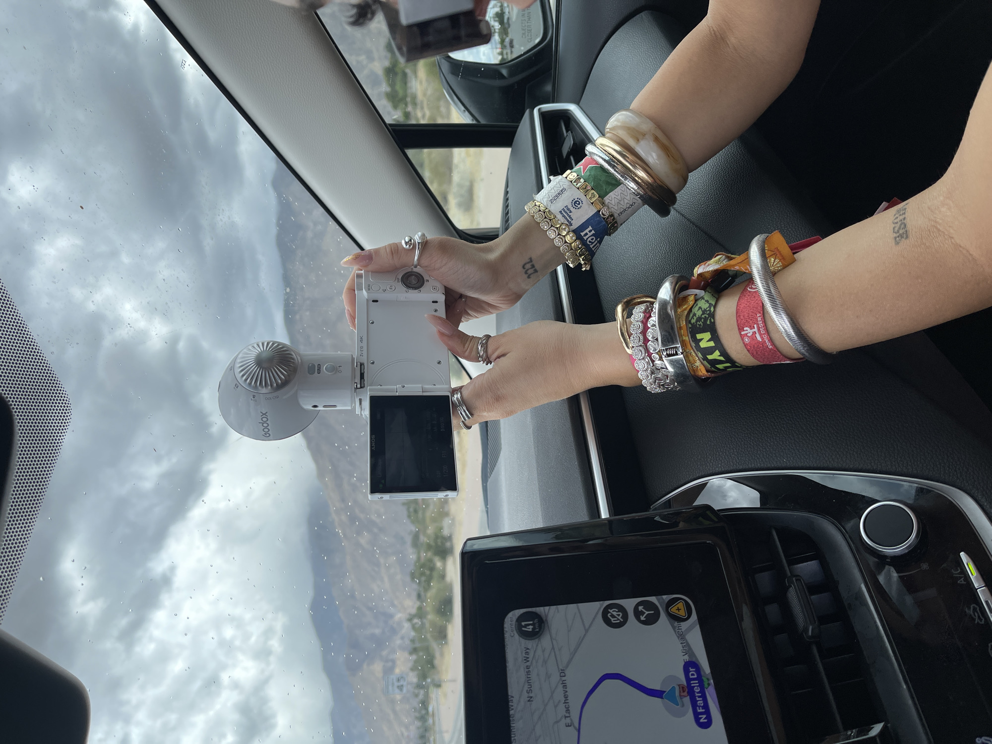 Dashboard view captured from vehicle interior in Palm Springs