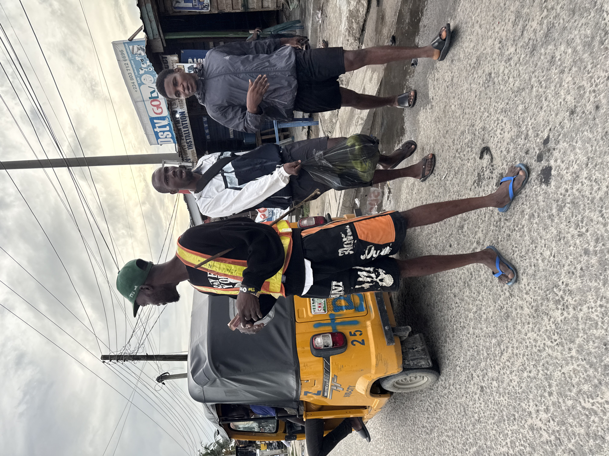 Street scenes captured in Ado, Nigeria during overcast afternoon
