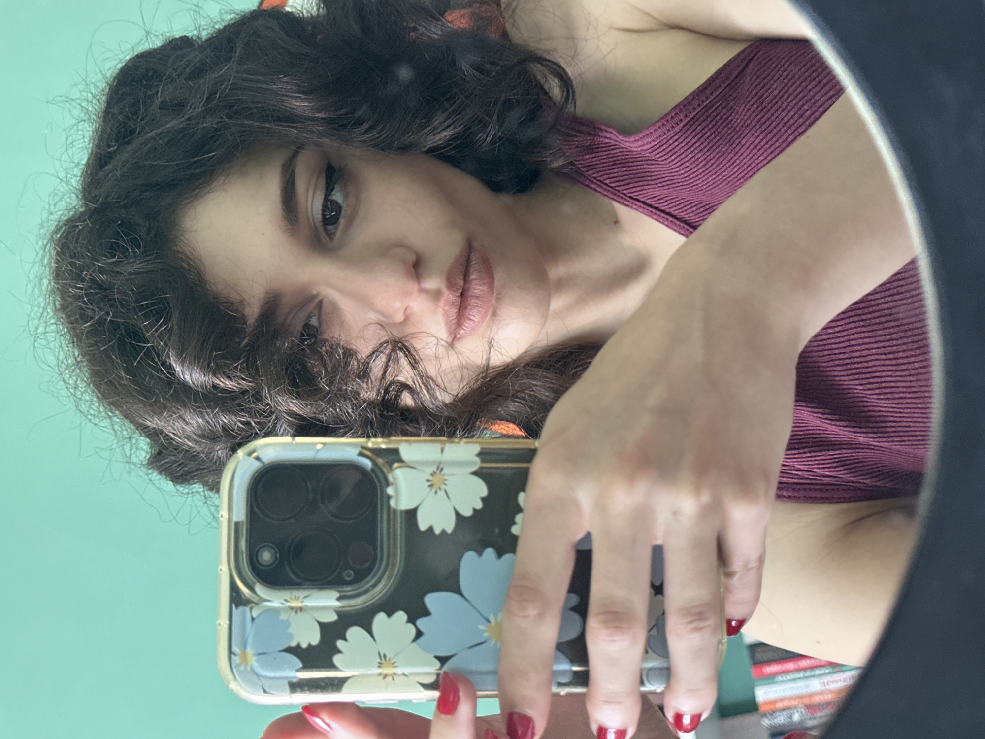 Selfie session in a Sofia room with a mint green wall.