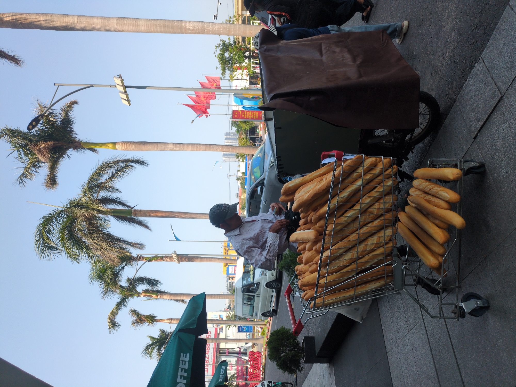 Morning street activity documented in Quy Nhon Ward, Vietnam