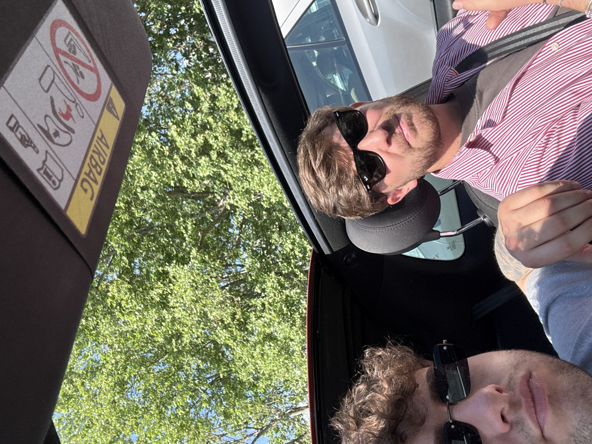 Two men spotted in sunlit car in Milan