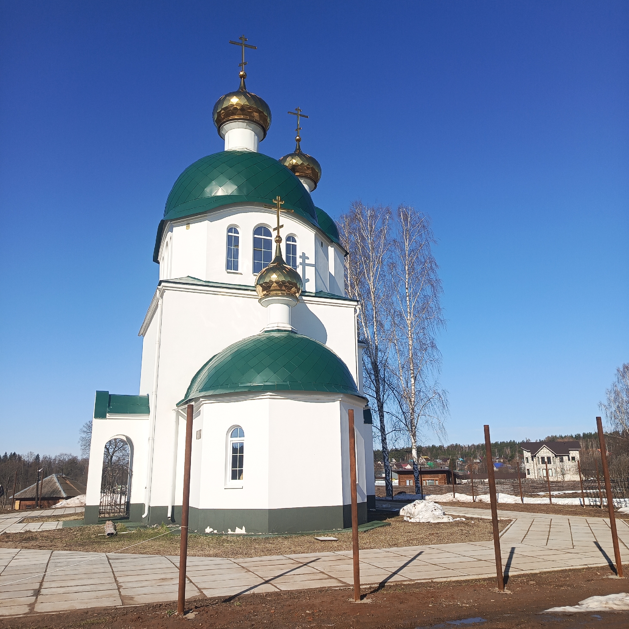 Orthodox church with golden domes observed in Markovo, Russia