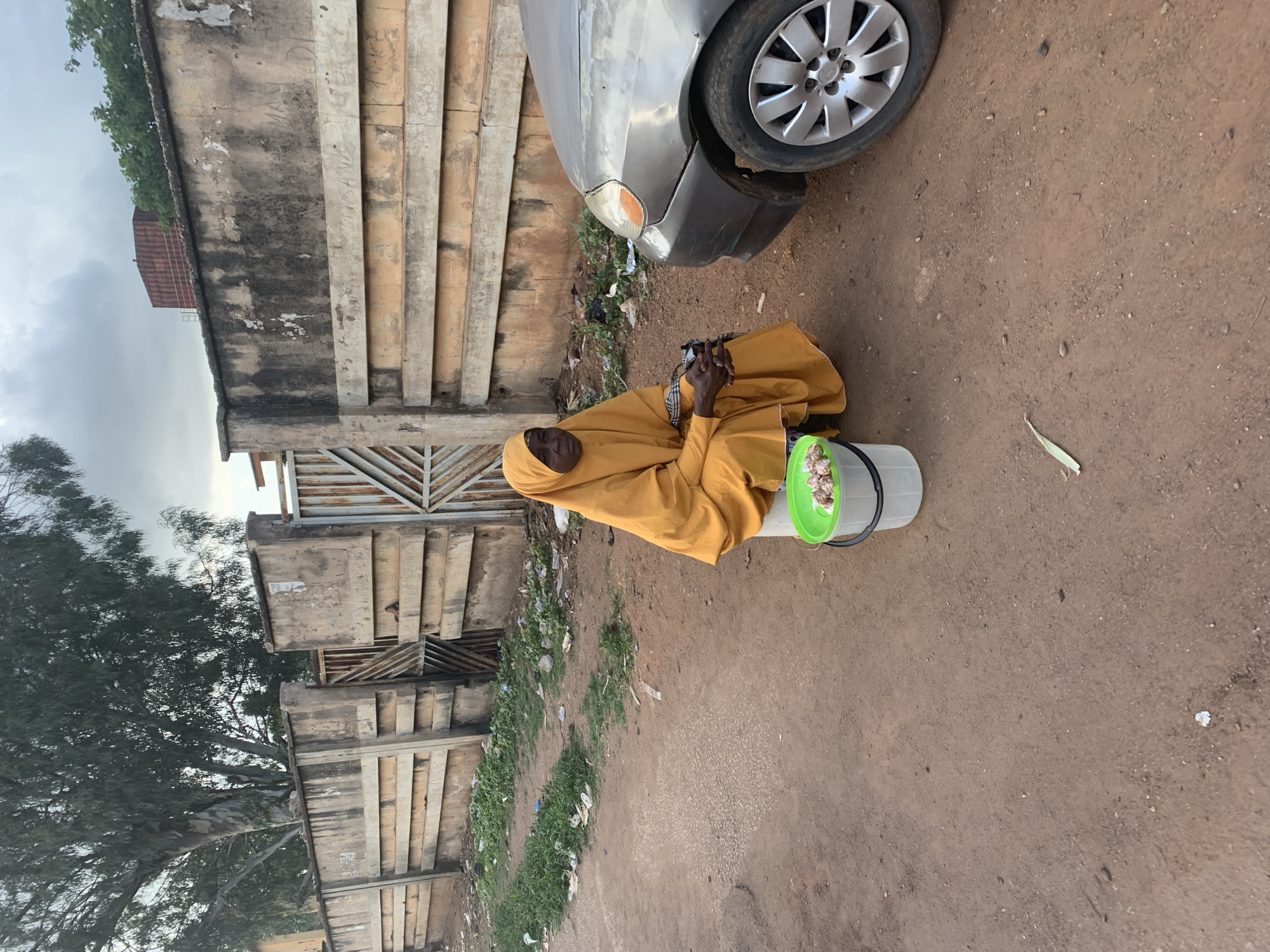 Street life and commerce moving through Jos, Nigeria
