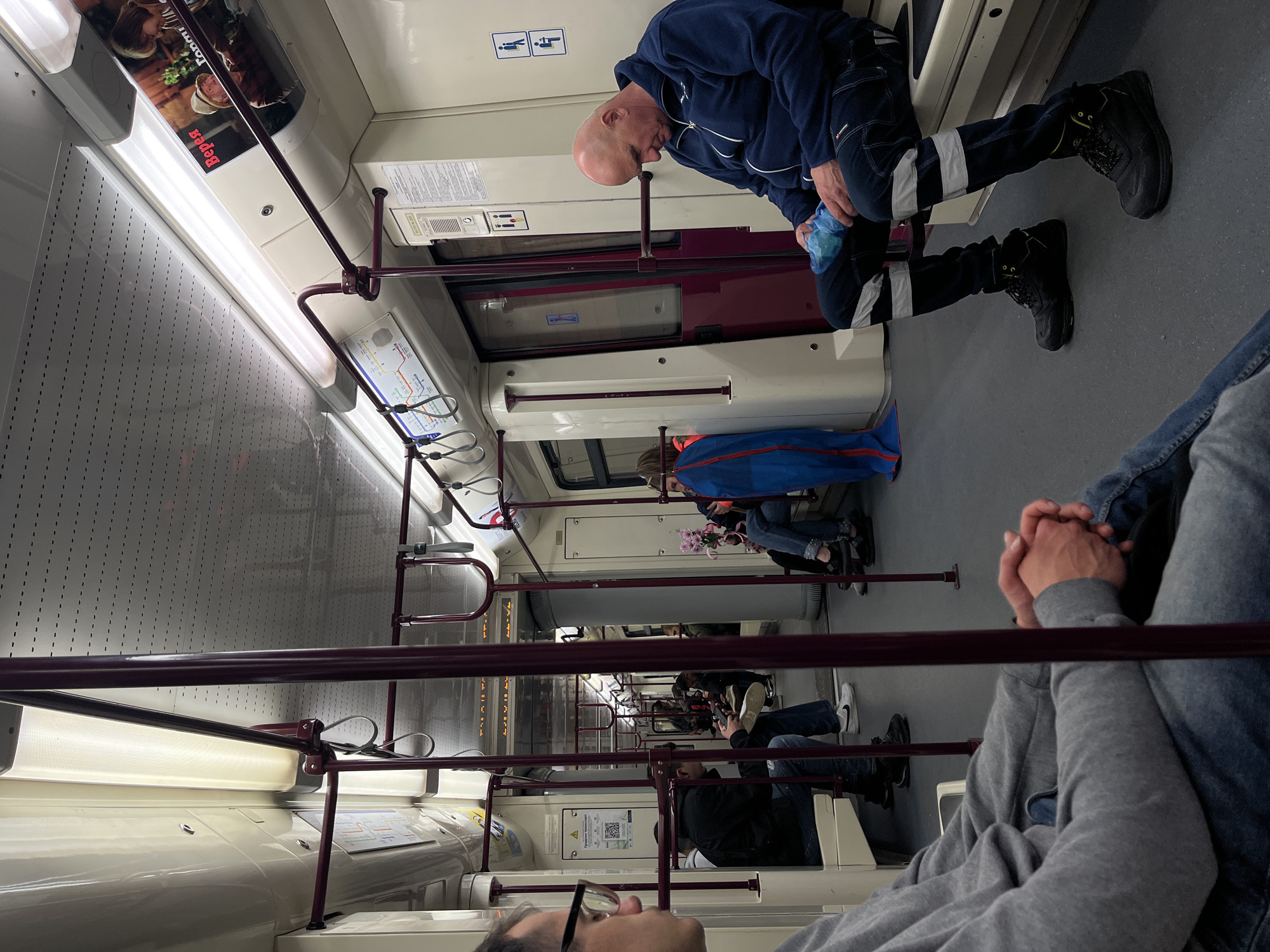 Passenger documents Sofia public transport interior from seated perspective
