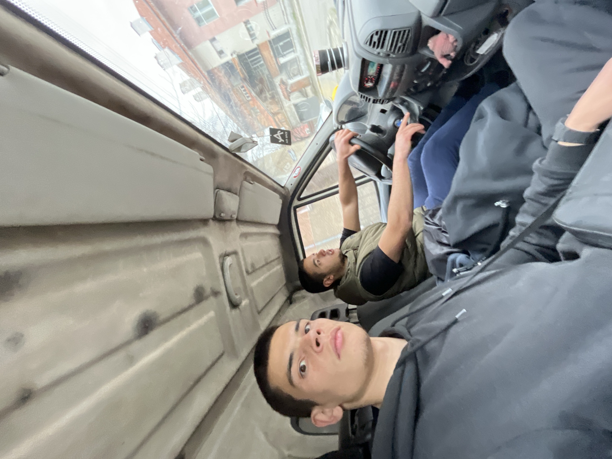 Two men travel by van in Sopot, Bulgaria