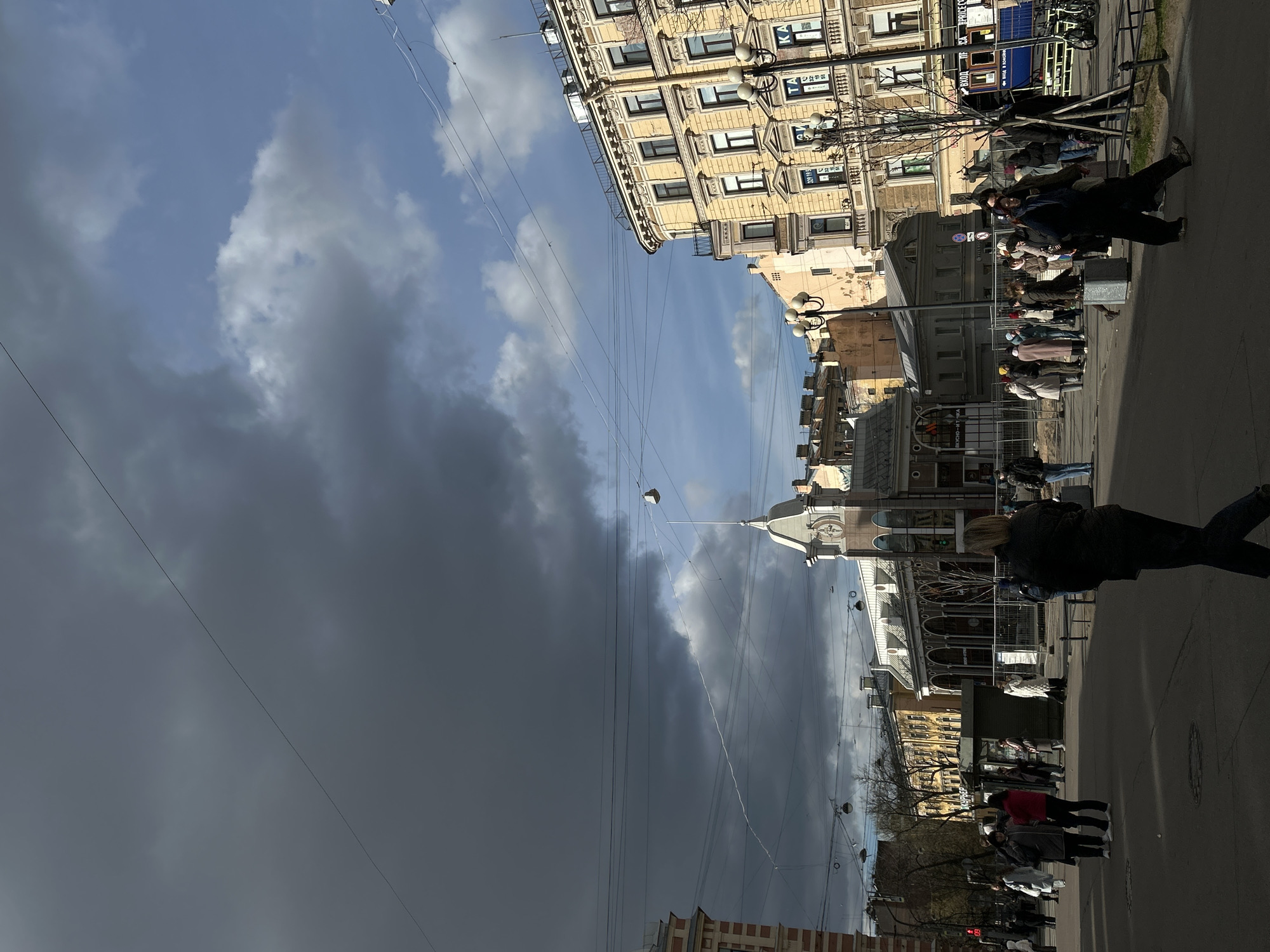 Woman documents afternoon walk through Saint Petersburg streets