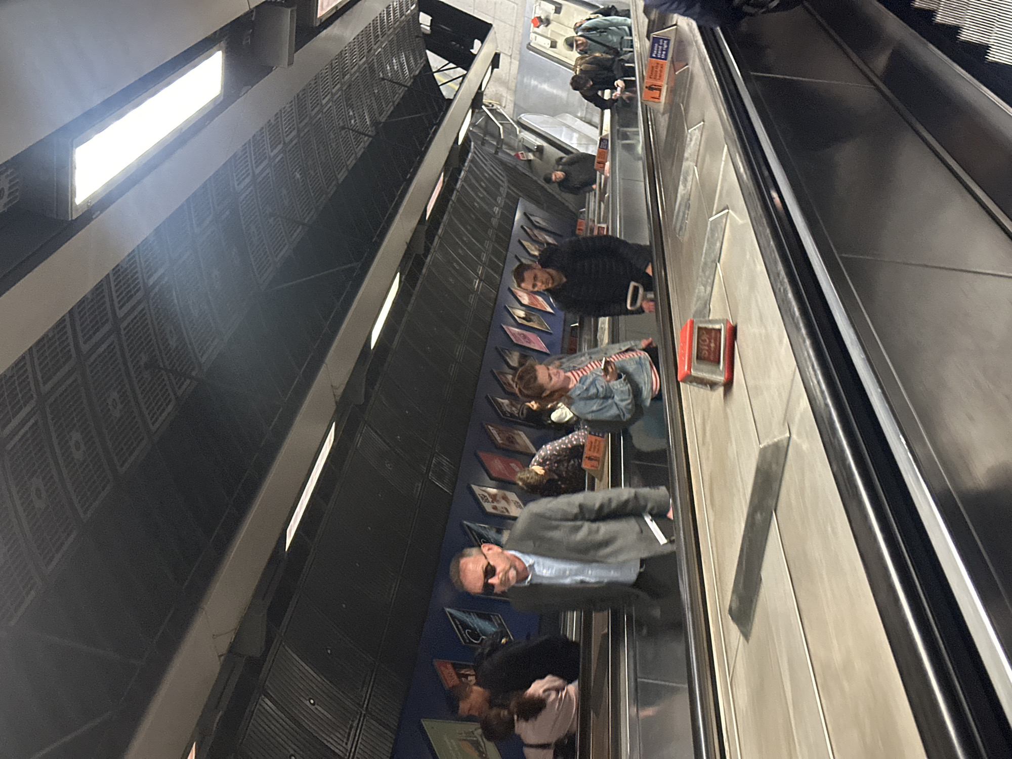 London Underground escalator captured from multiple angles during morning commute