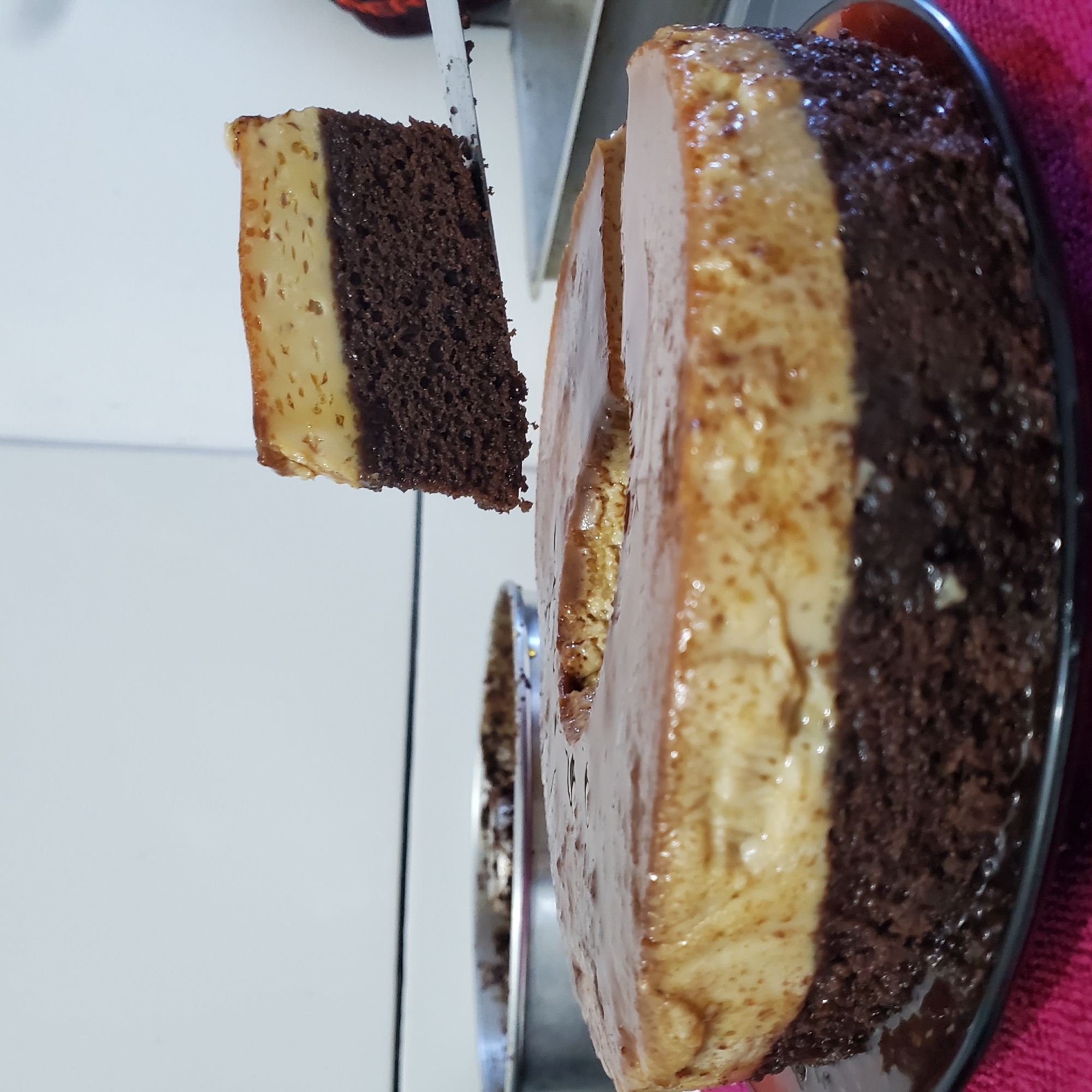 Layered pudding cake sliced and photographed in Curitiba