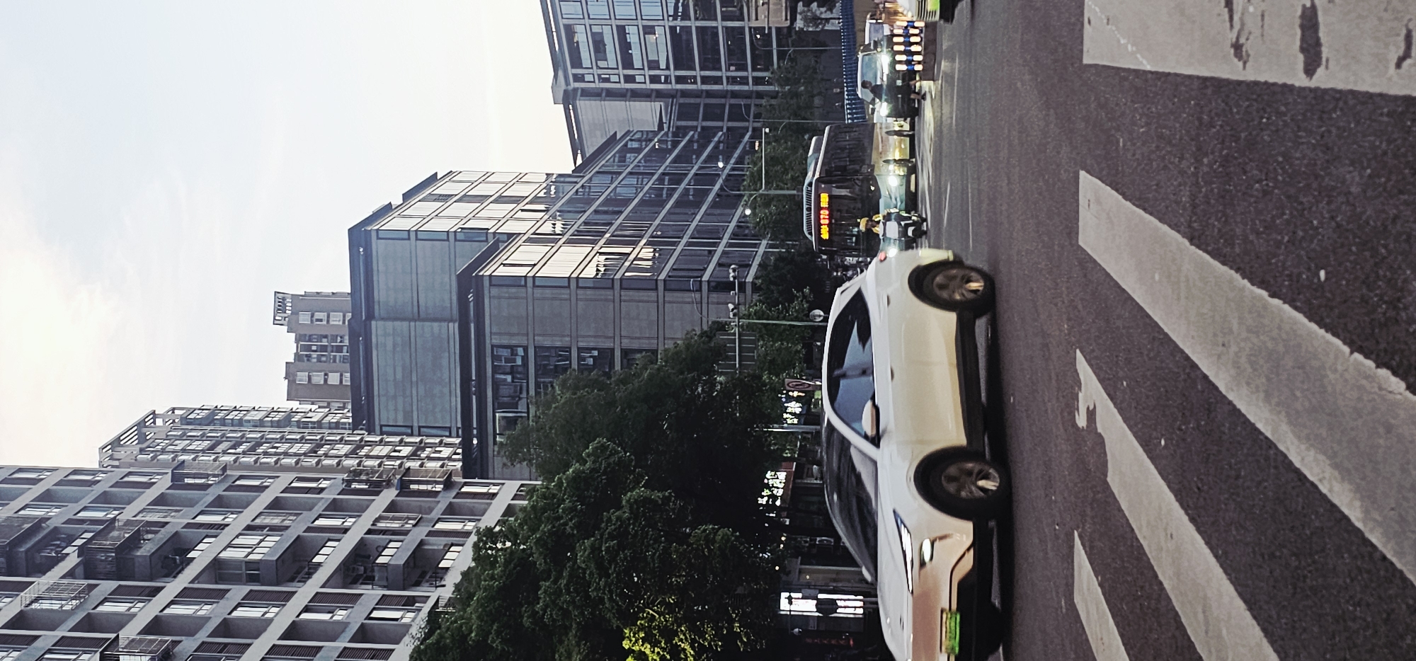 Regular traffic flows through downtown Yuzhong District streets