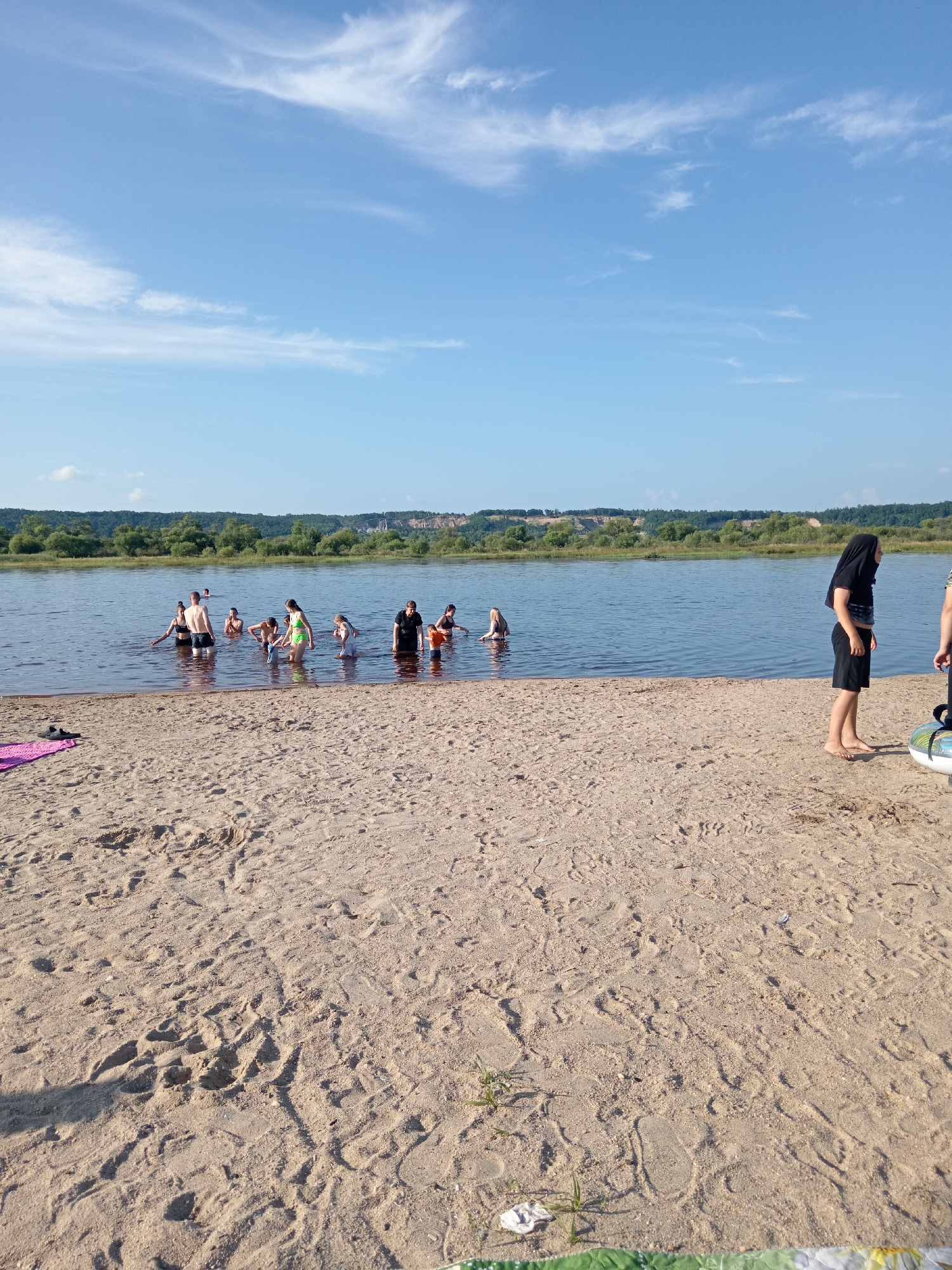 Lazy summer morning at a riverbank beach in Belogorsk