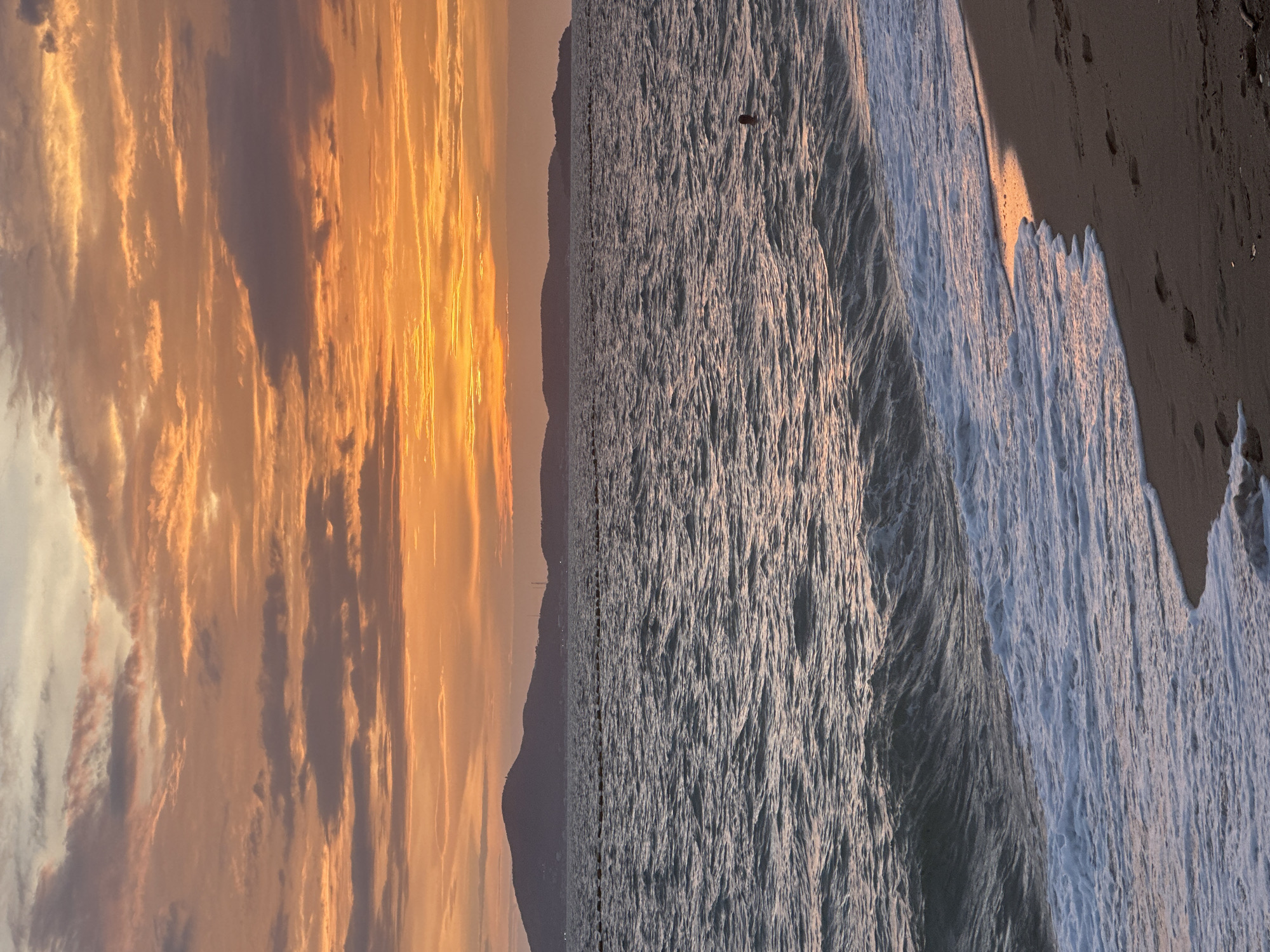 Vivid ocean sunset lights up the sky over Pattaya