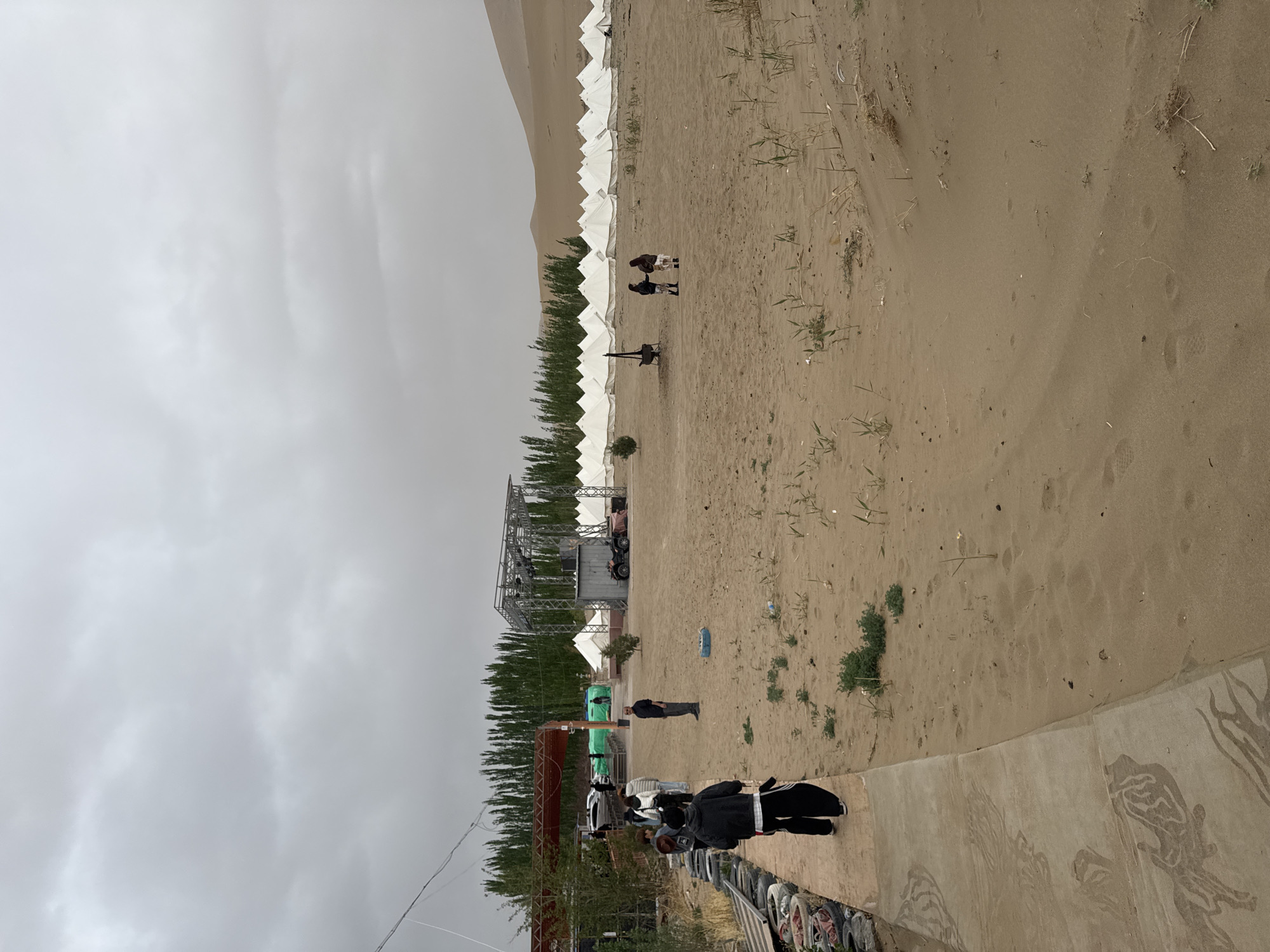 Desert camp with tents, construction documented in Dunhuang, China