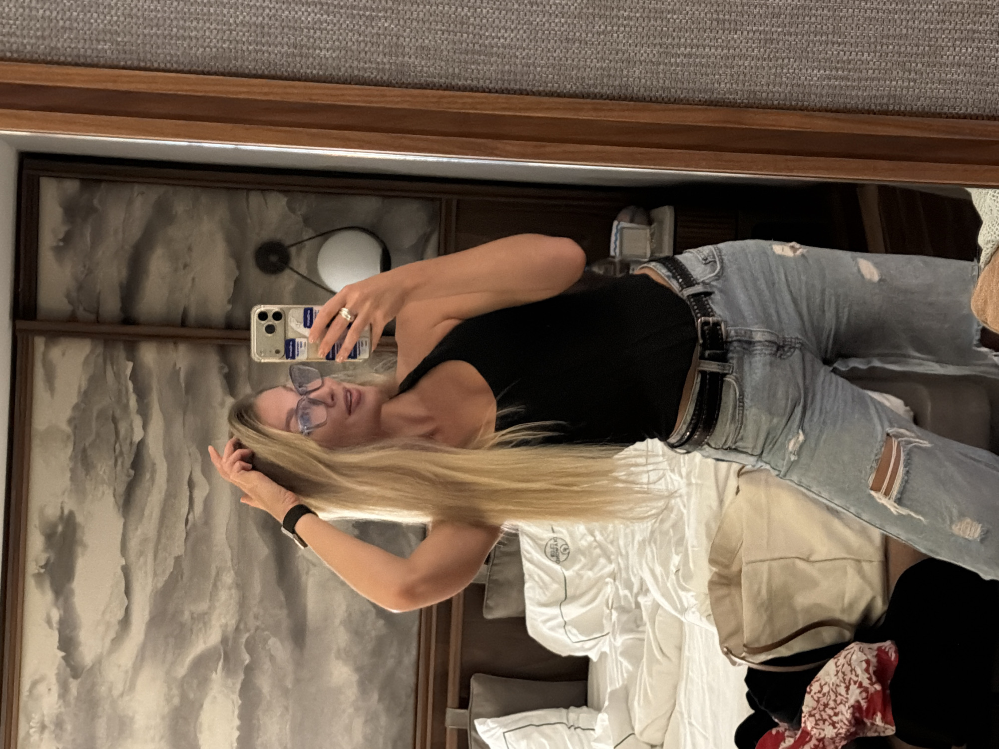 Woman takes mirror selfie in Beldibi, Turkey