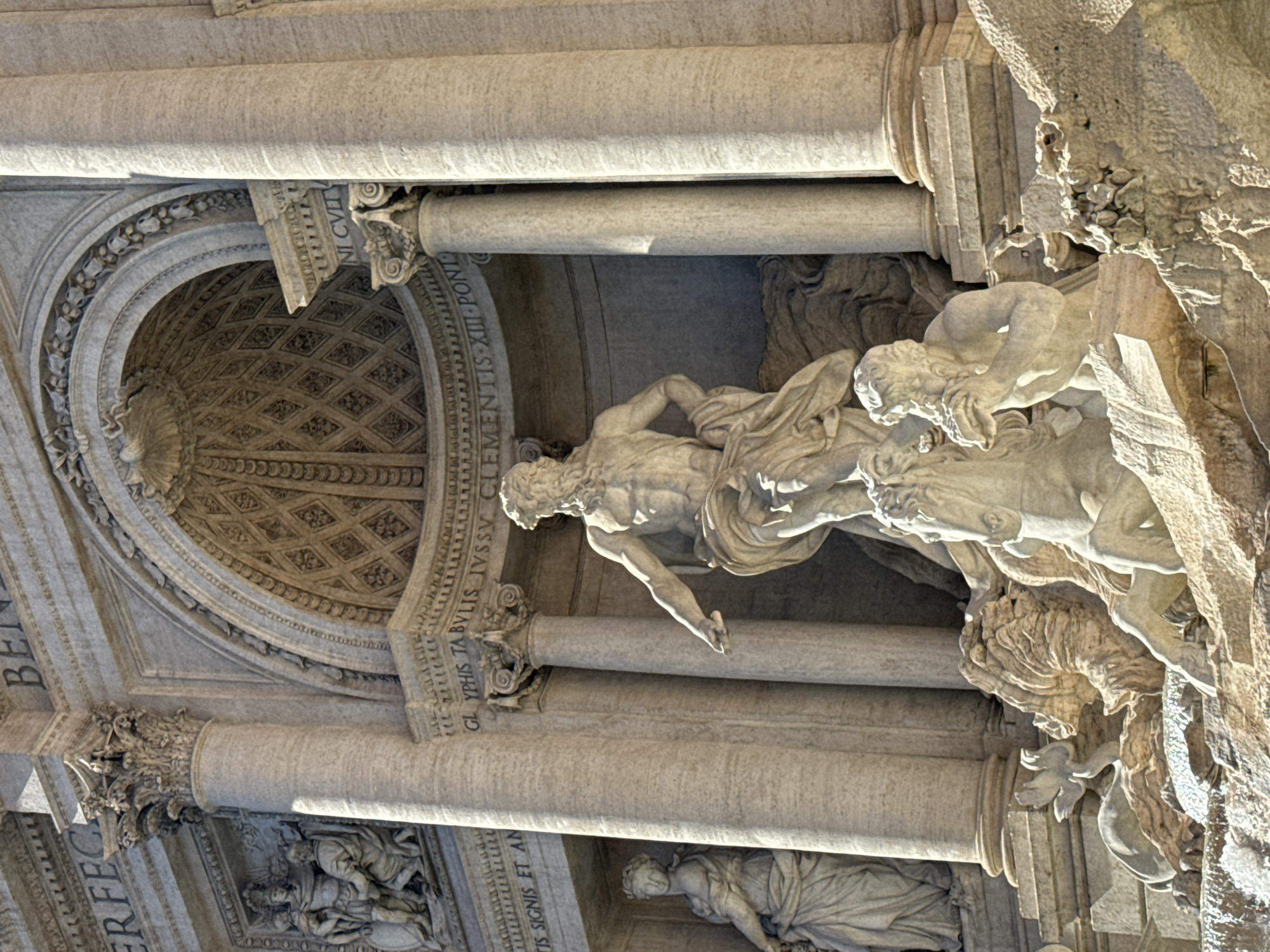 Tourists gather at Rome's iconic Trevi Fountain
