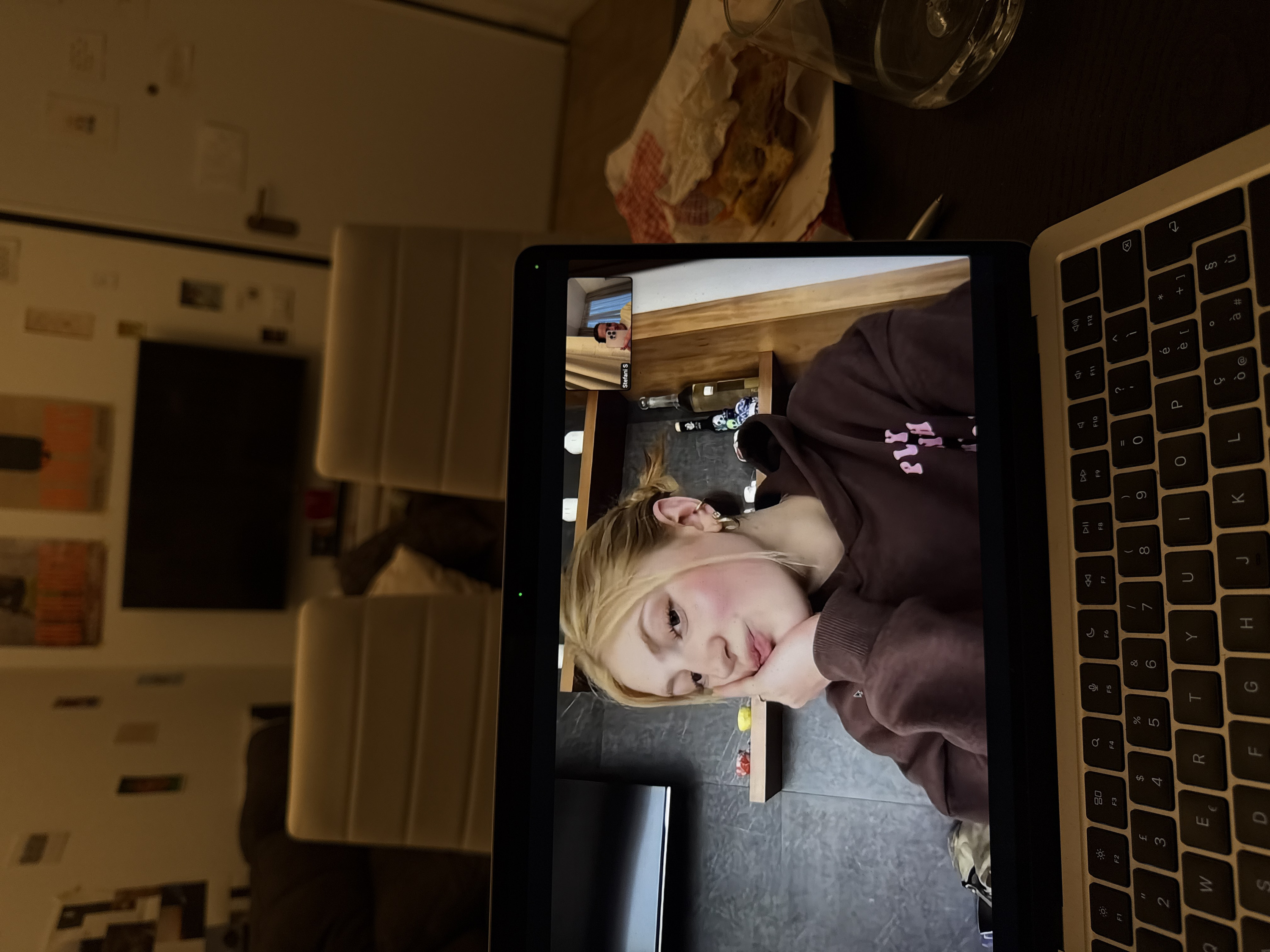 Laptop captured in Milan residential interior scene
