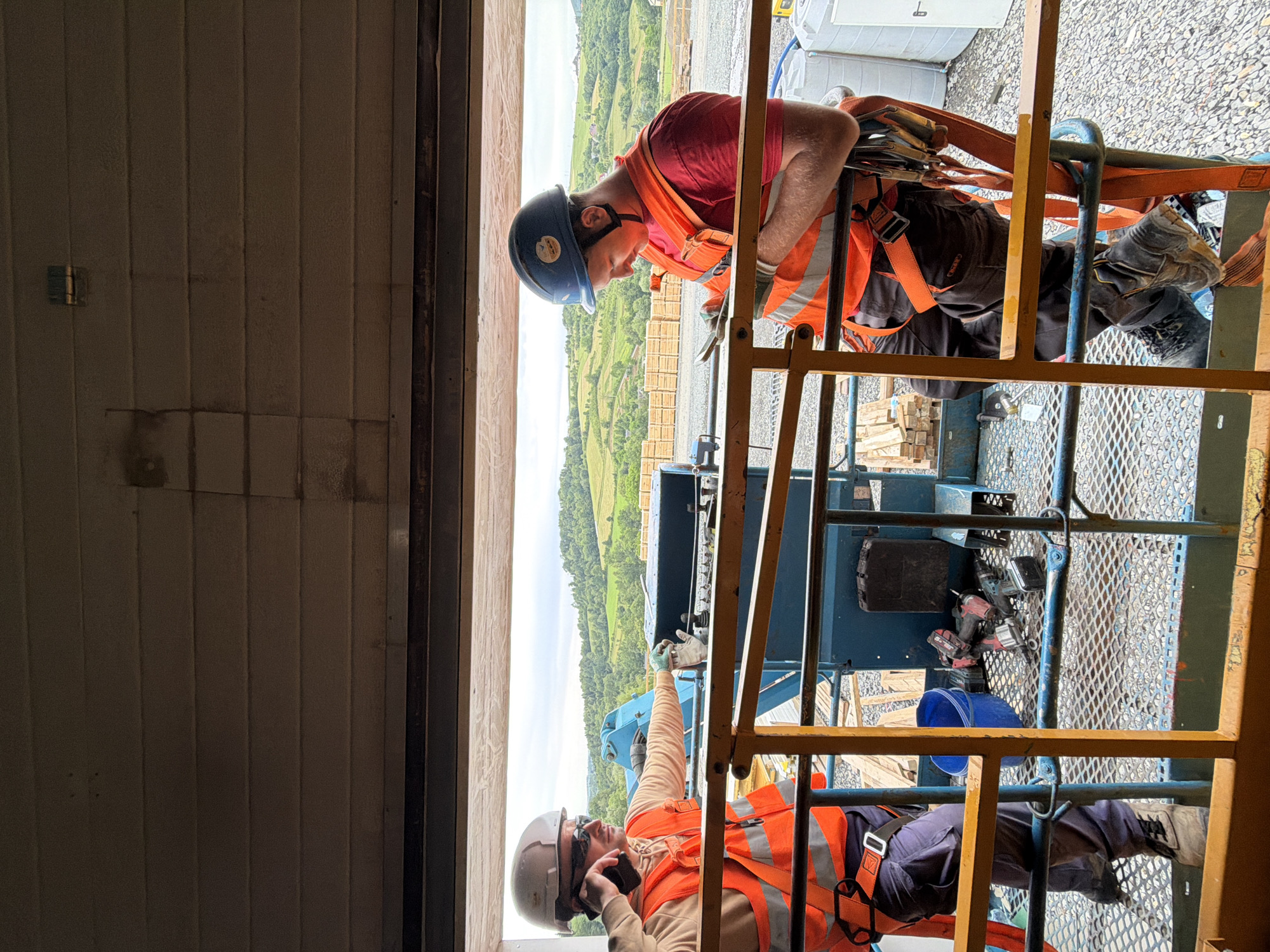 Aerial platform work at twin construction sites in rural Poland