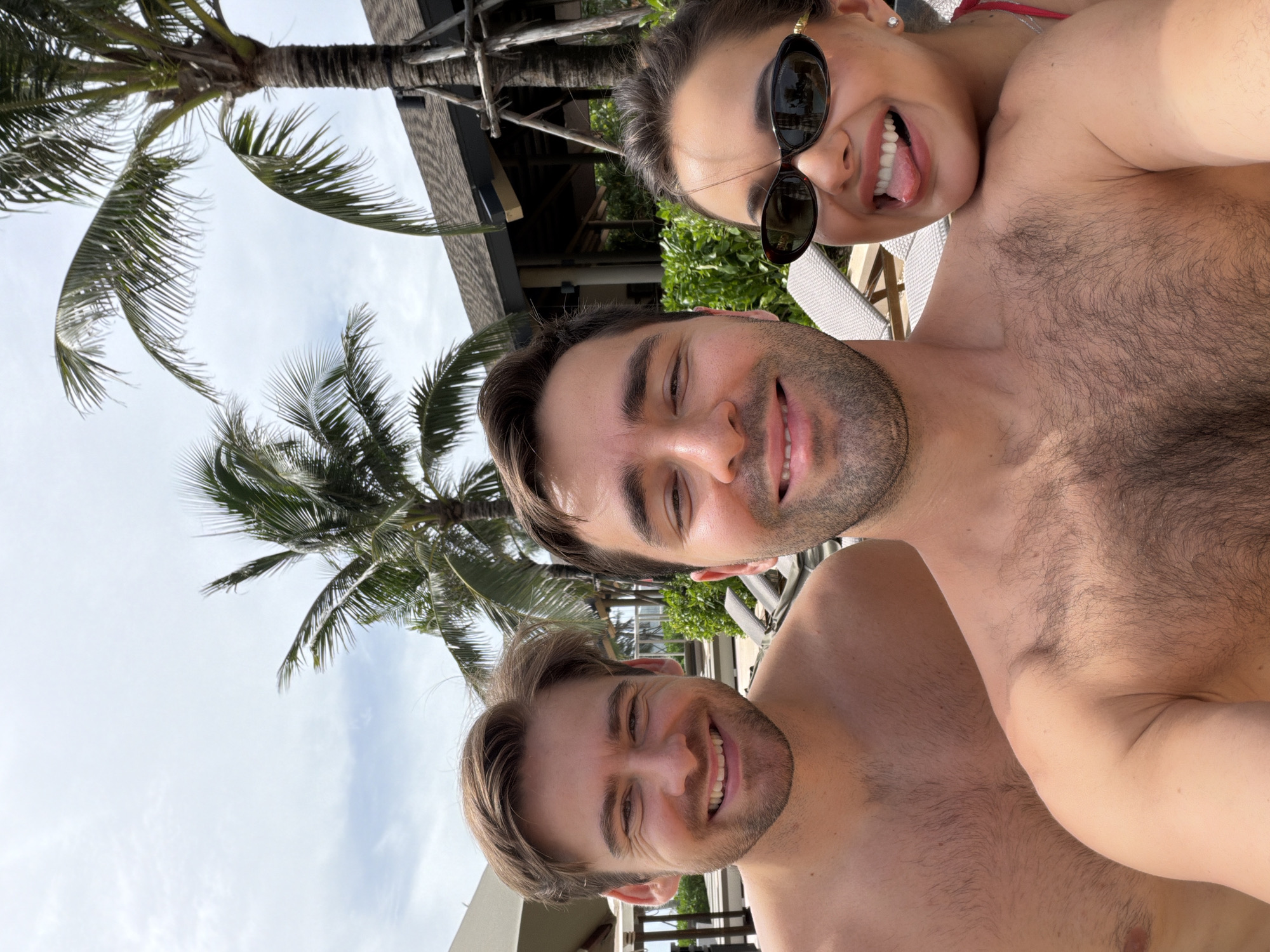 Tourists take poolside selfies at Thailand resort
