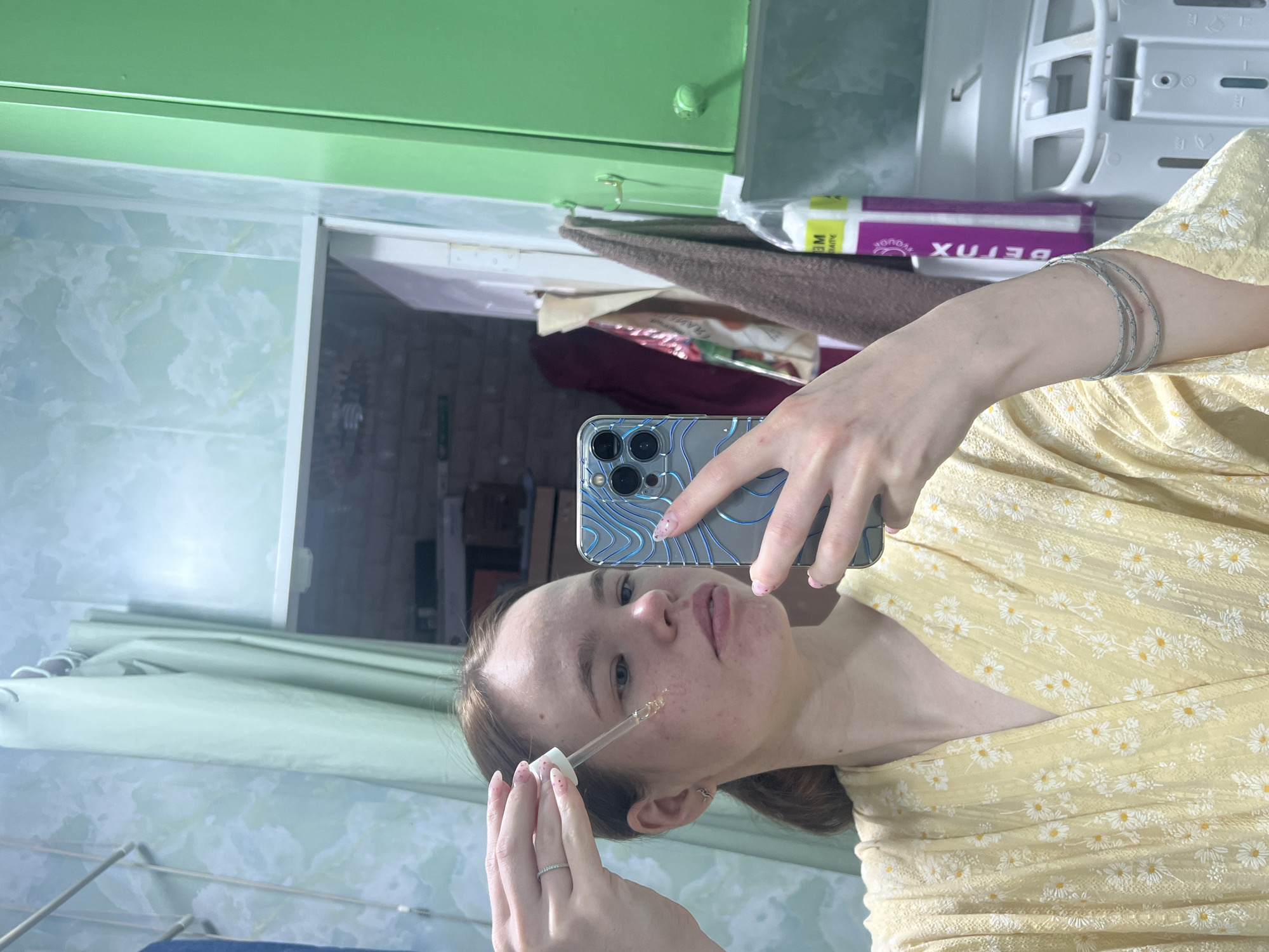 Woman documents early morning skincare routine in Russian bathroom