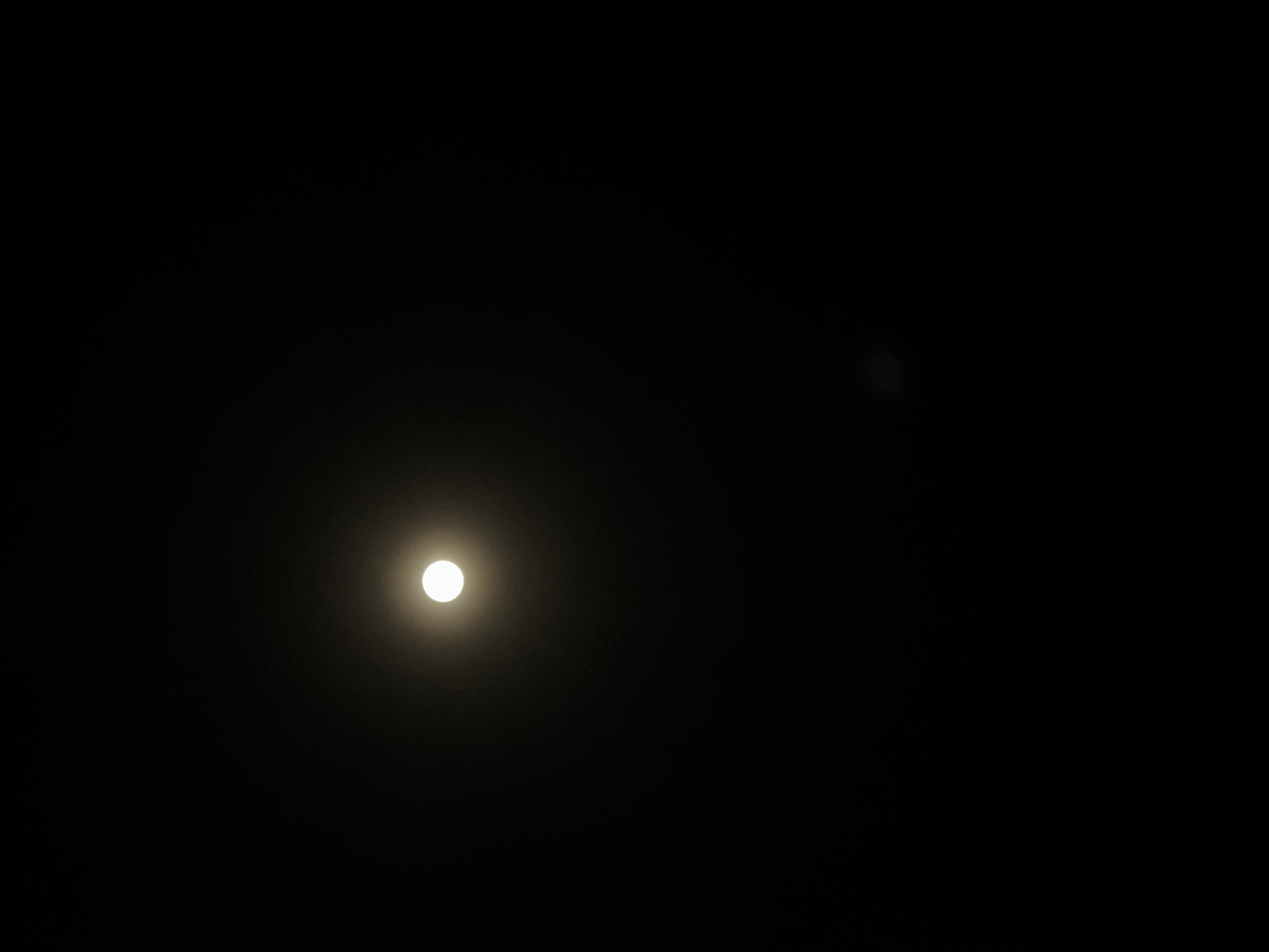 Witness observes moon and secondary object during nighttime scene