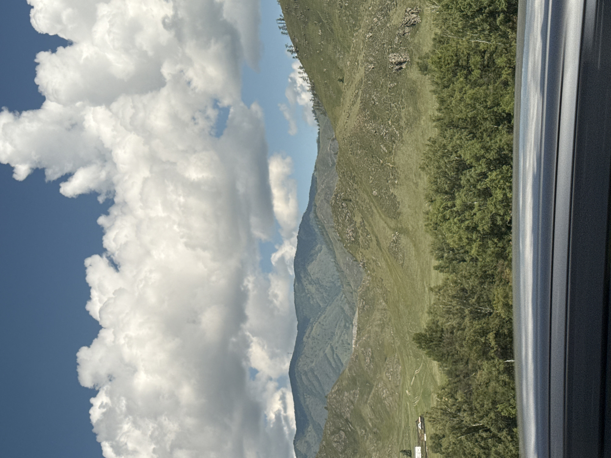 Driving through Altai mountain landscapes near Onguday, Russia