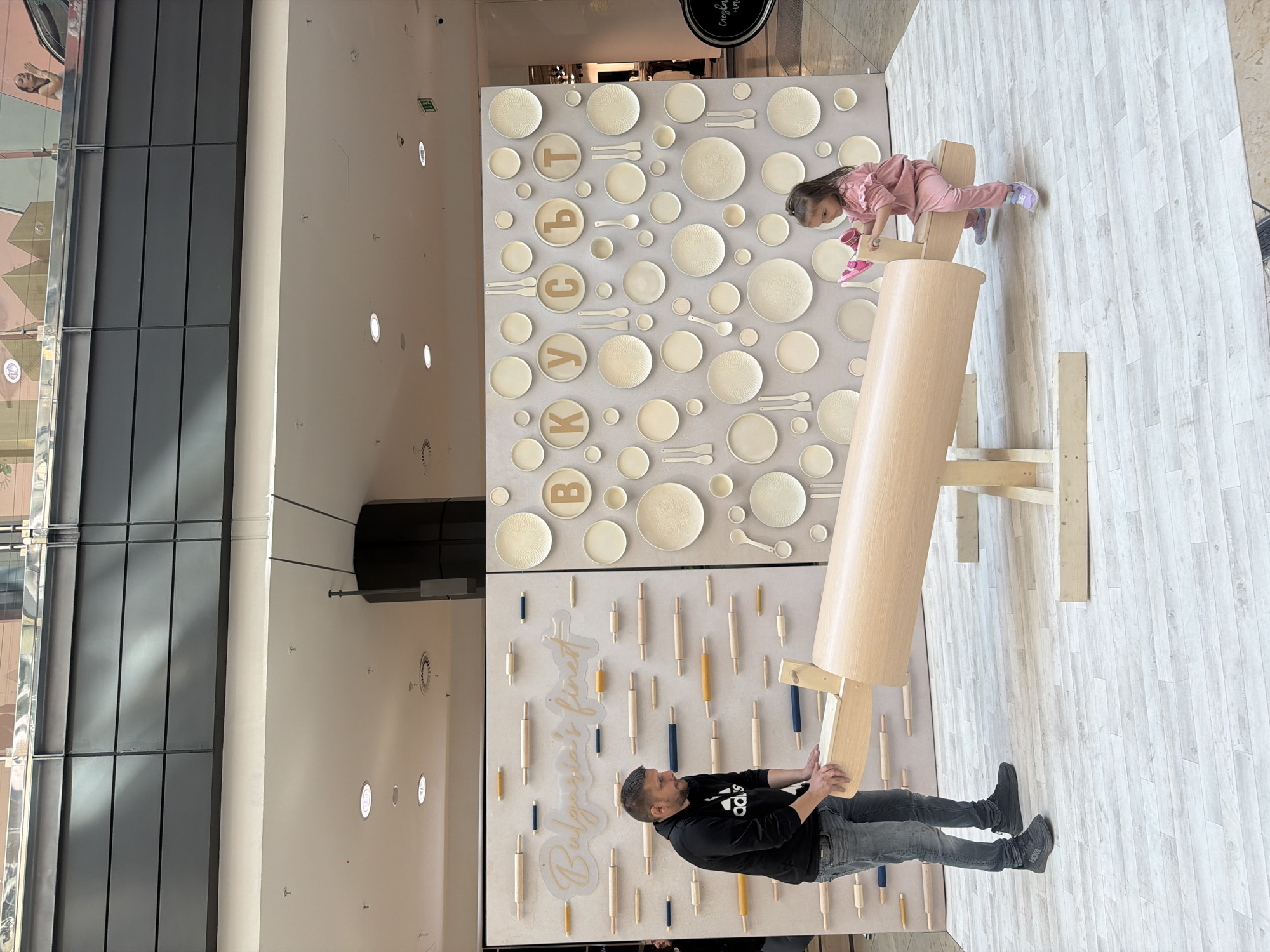 Shopping mall visitors engage with art installation in Sofia