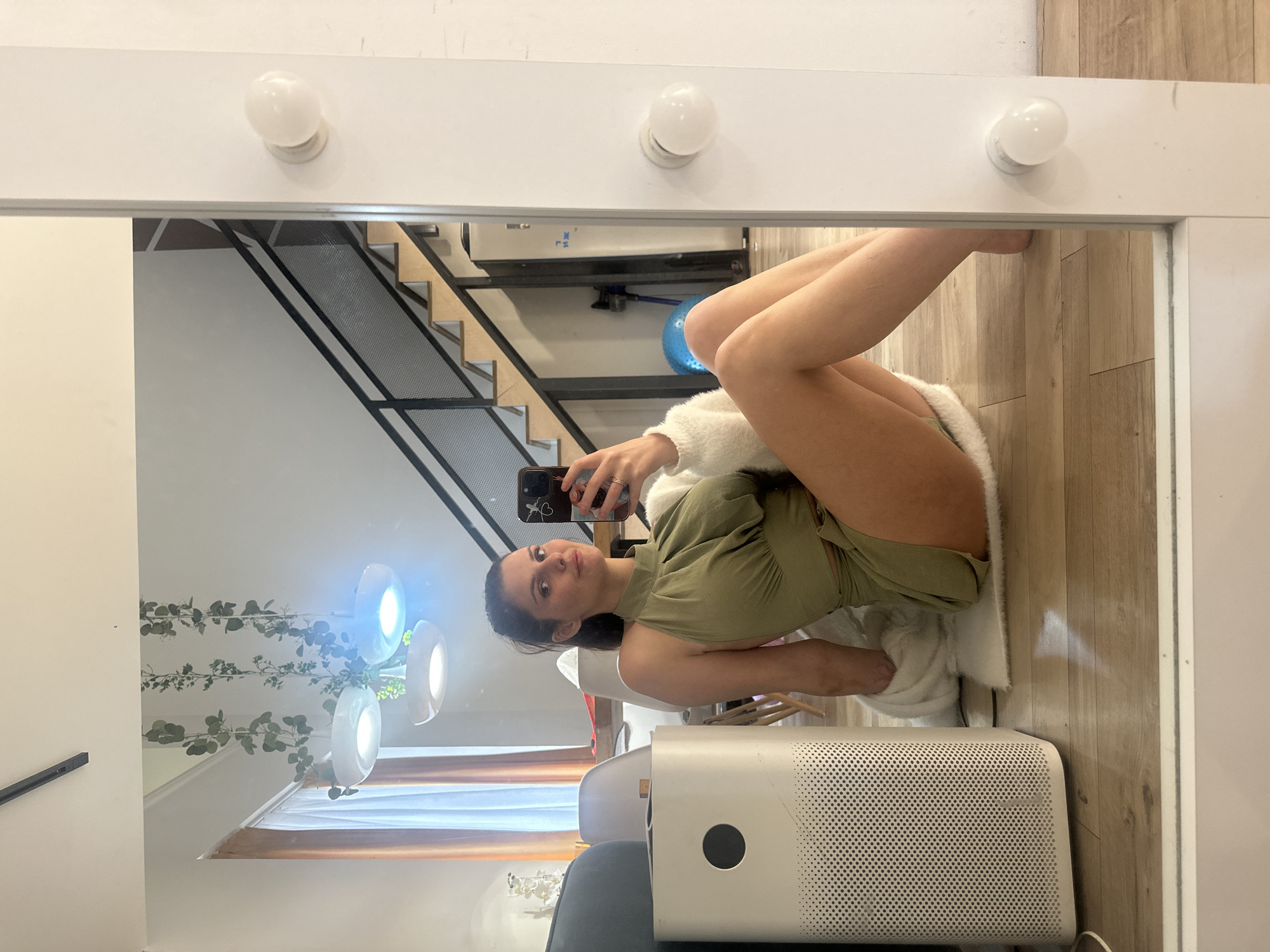 Afternoon selfie session in a green outfit, with a pit stop