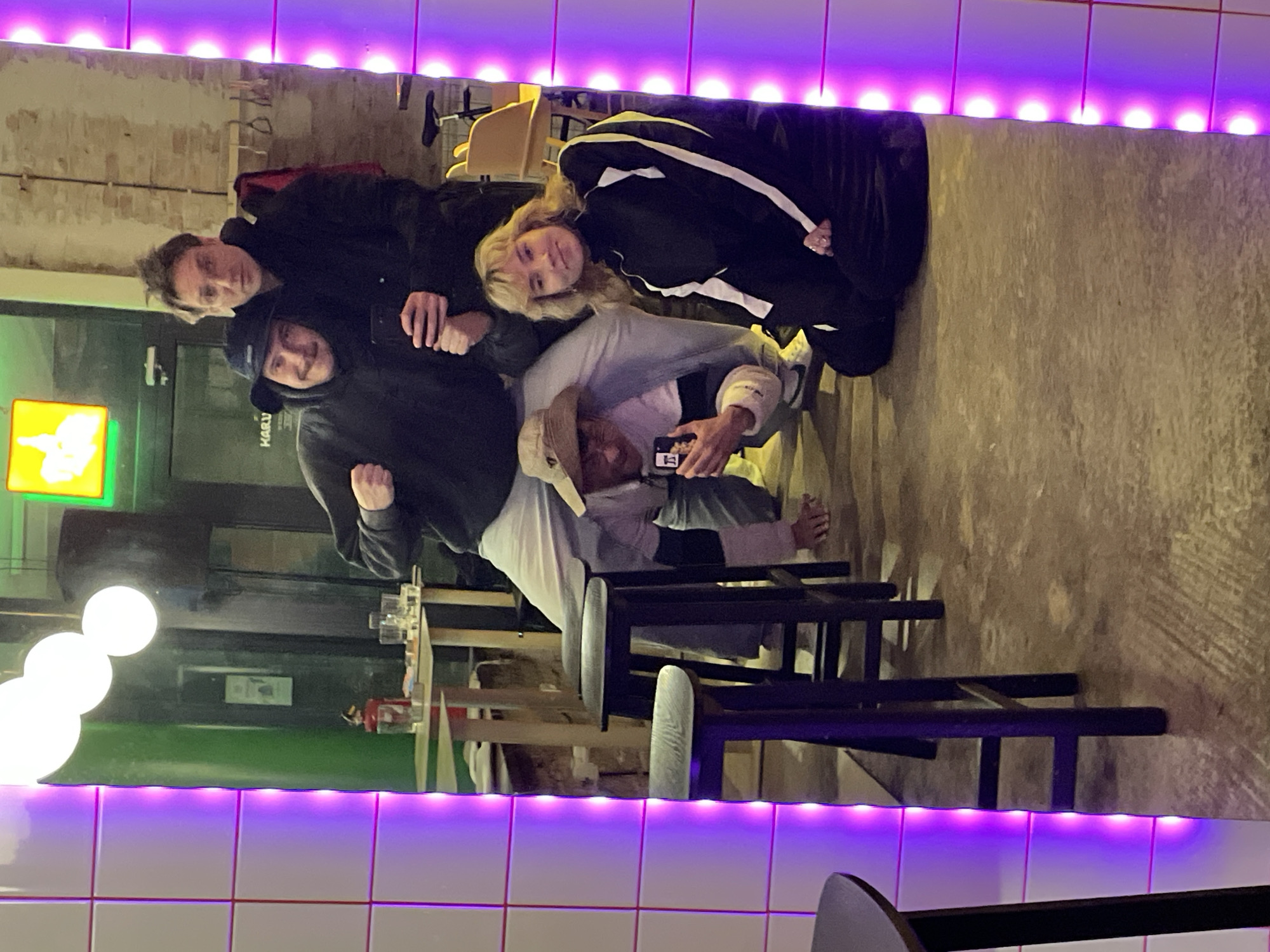 Group poses for photos at Belgrade restaurant