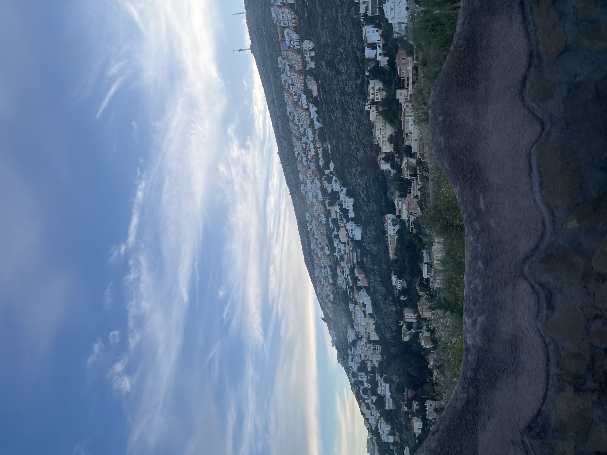 White villas on Spanish hillside captured in evening photograph