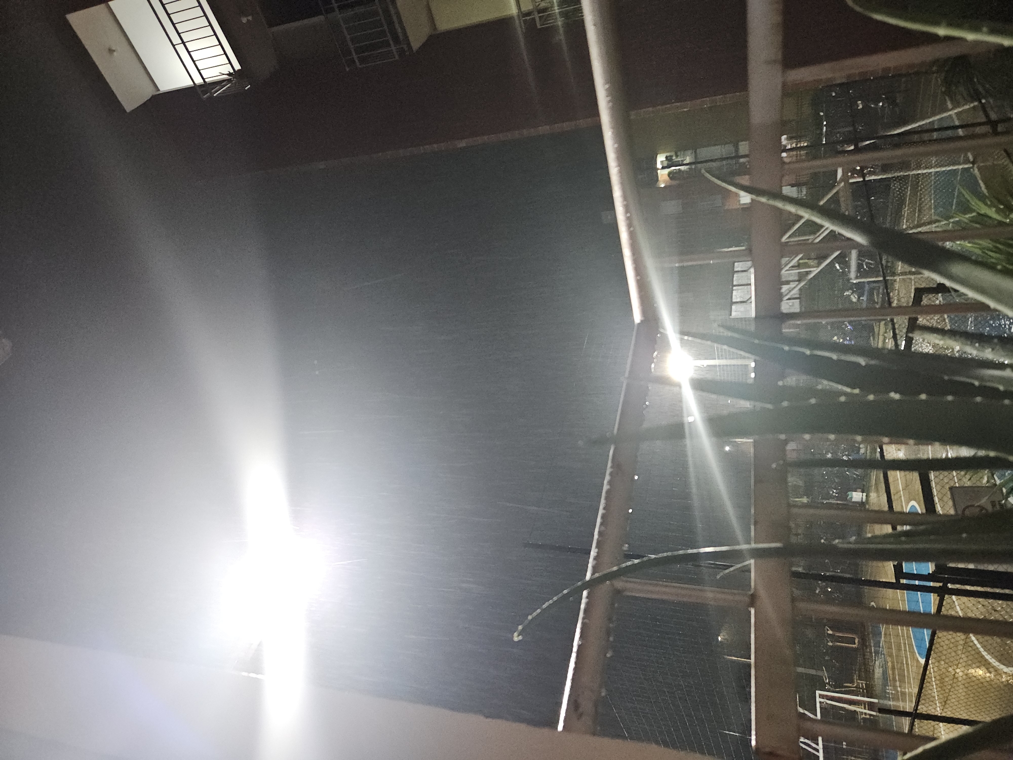 Heavy nighttime rainstorm floods basketball court in Cúcuta, Colombia