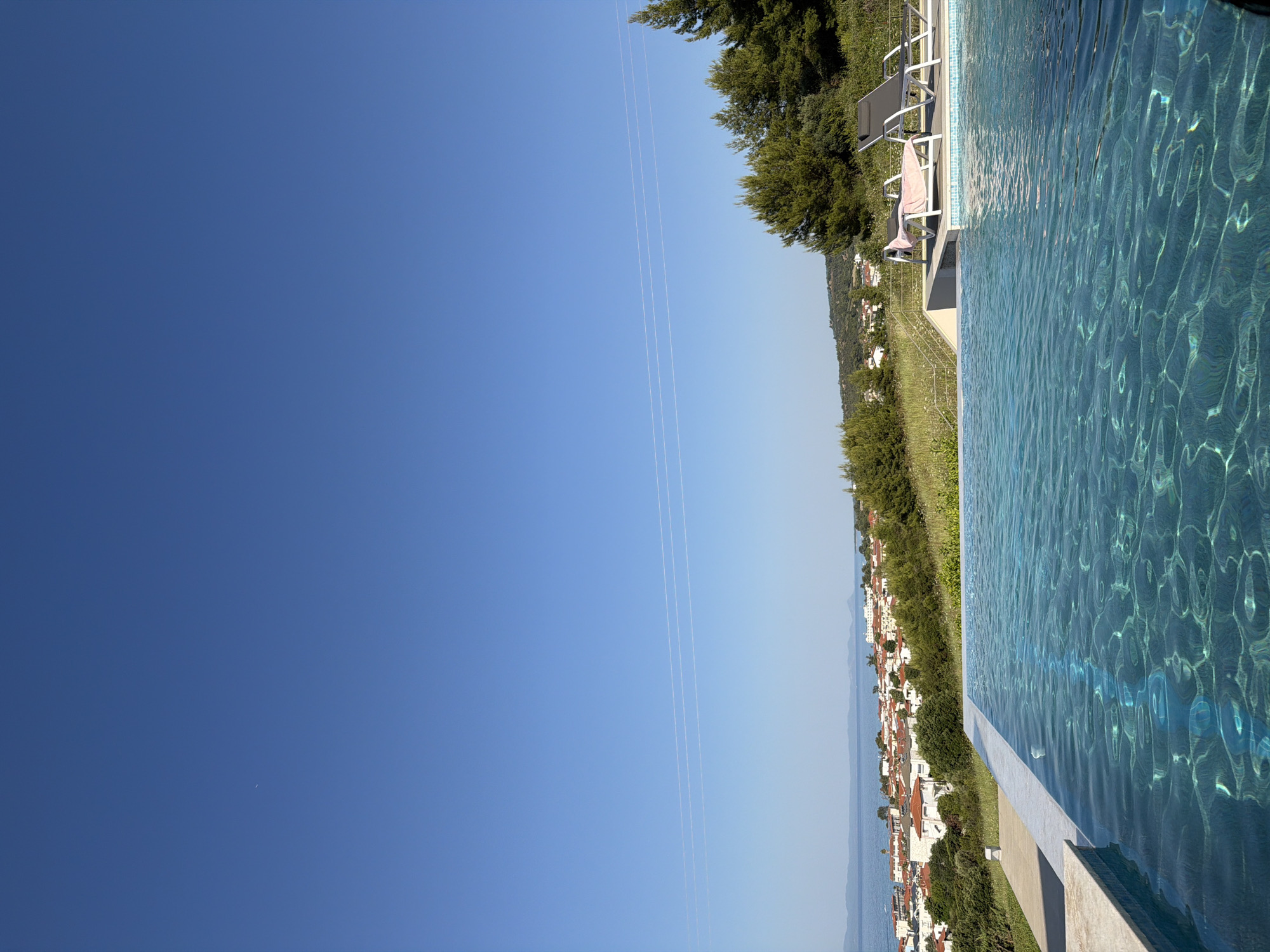 Poolside afternoon at a coastal resort in Pallini, Greece