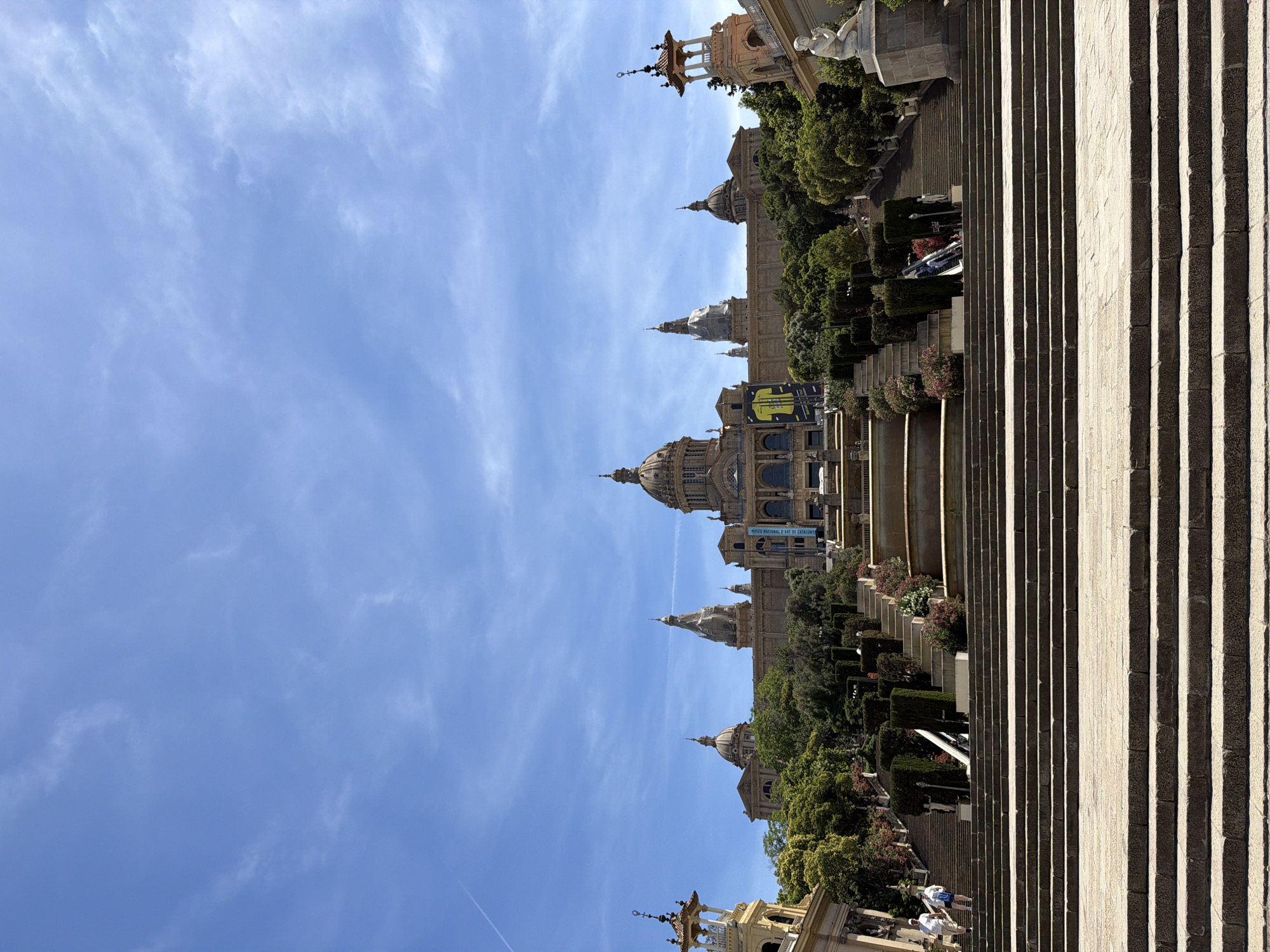 Tourists visit Barcelona's Palau Nacional during Saturday afternoon