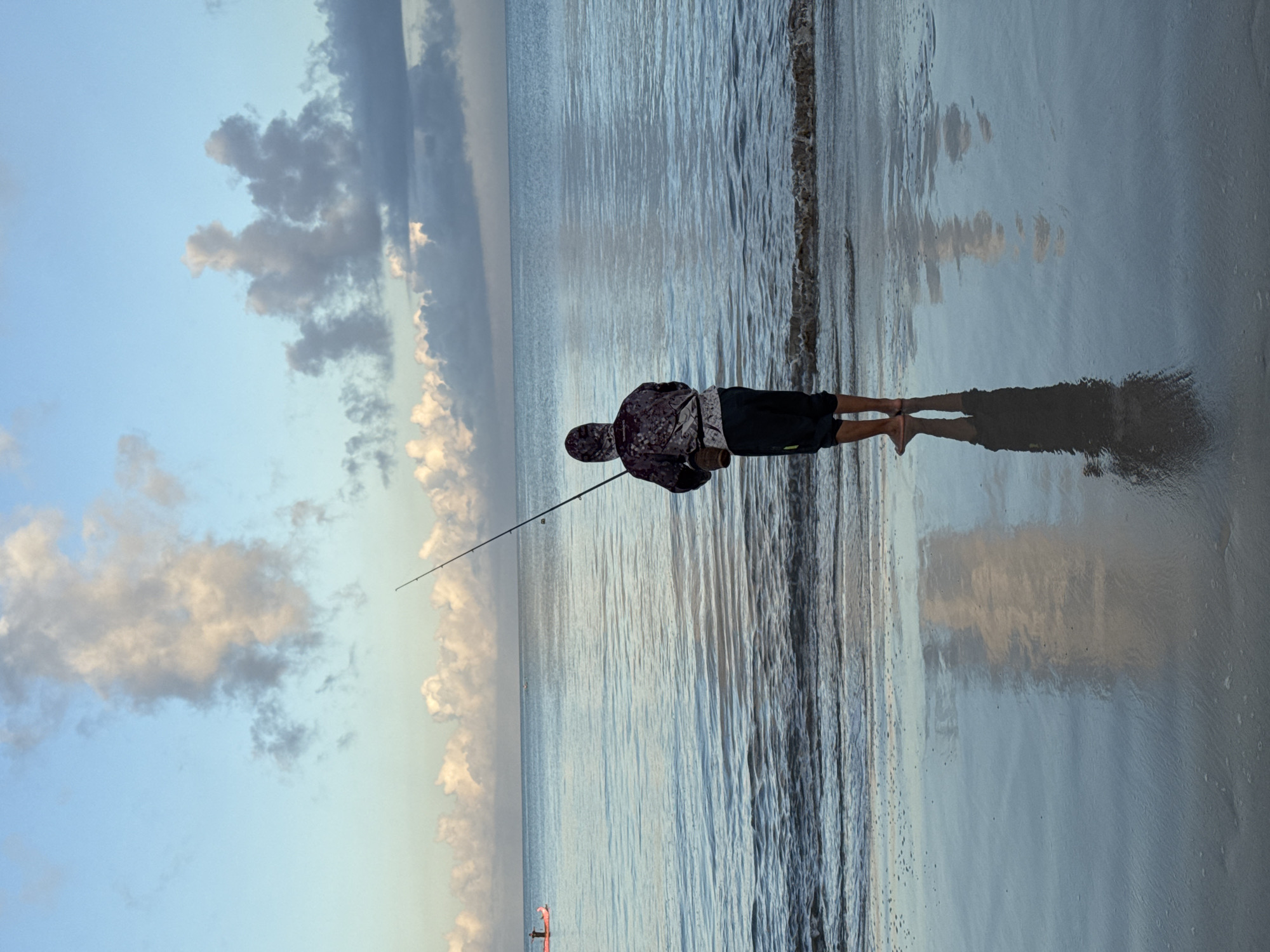 Evening fishing activities documented along Kuta beach, Indonesia