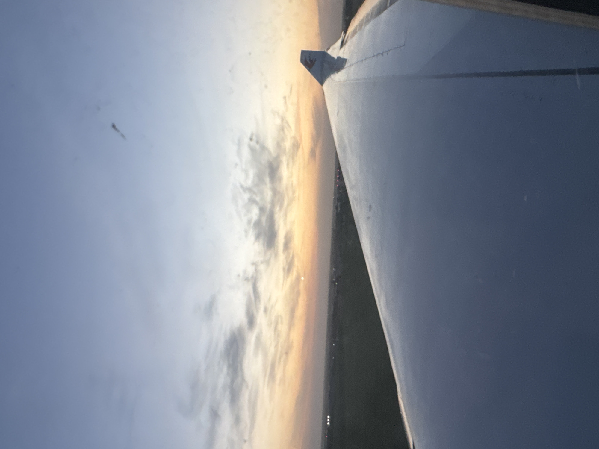 Aircraft captures aerial sunset view over Stolbishche, Russia